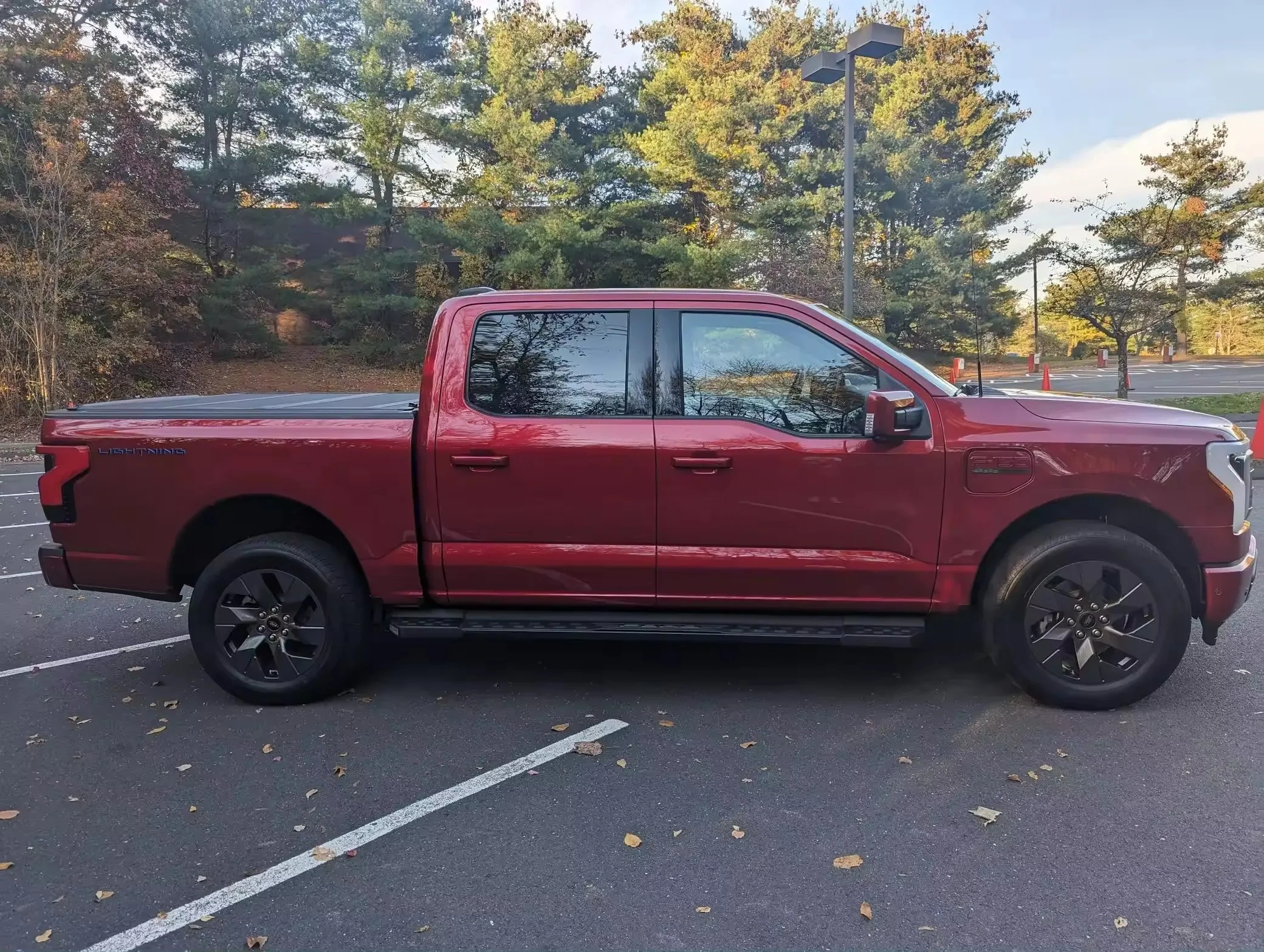 Clean Used 2022 Fordd F-150 Lightning Lariat Extended Range Battery AWD Rapid Red Metallic Mostly Unmodified (Mileage 14.000)