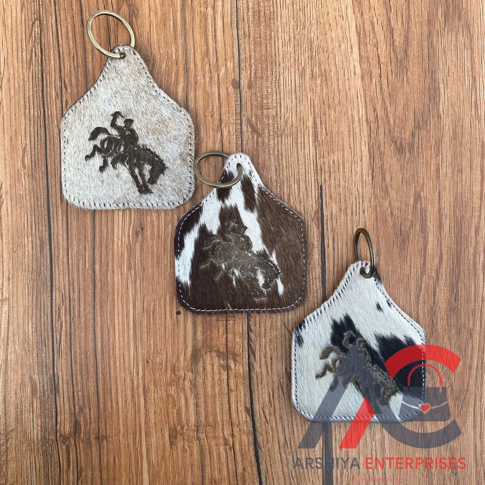 Newest Custom OEM Cowhide Laser Embossed Luxury Keychain Western Hair On Genuine Leather Mini Personalized Keyring for Promotion