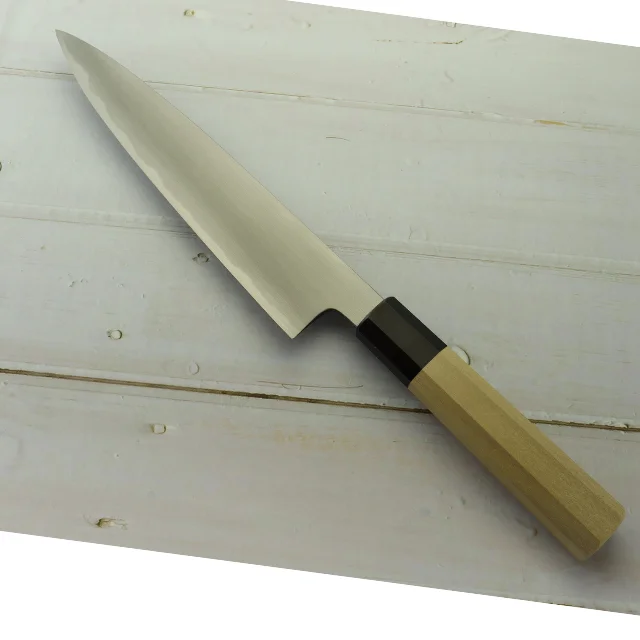 Gyuto Knife double edge blade Japanese knife crafted by a skilled blacksmith using an ancient Japanese manufacturing method