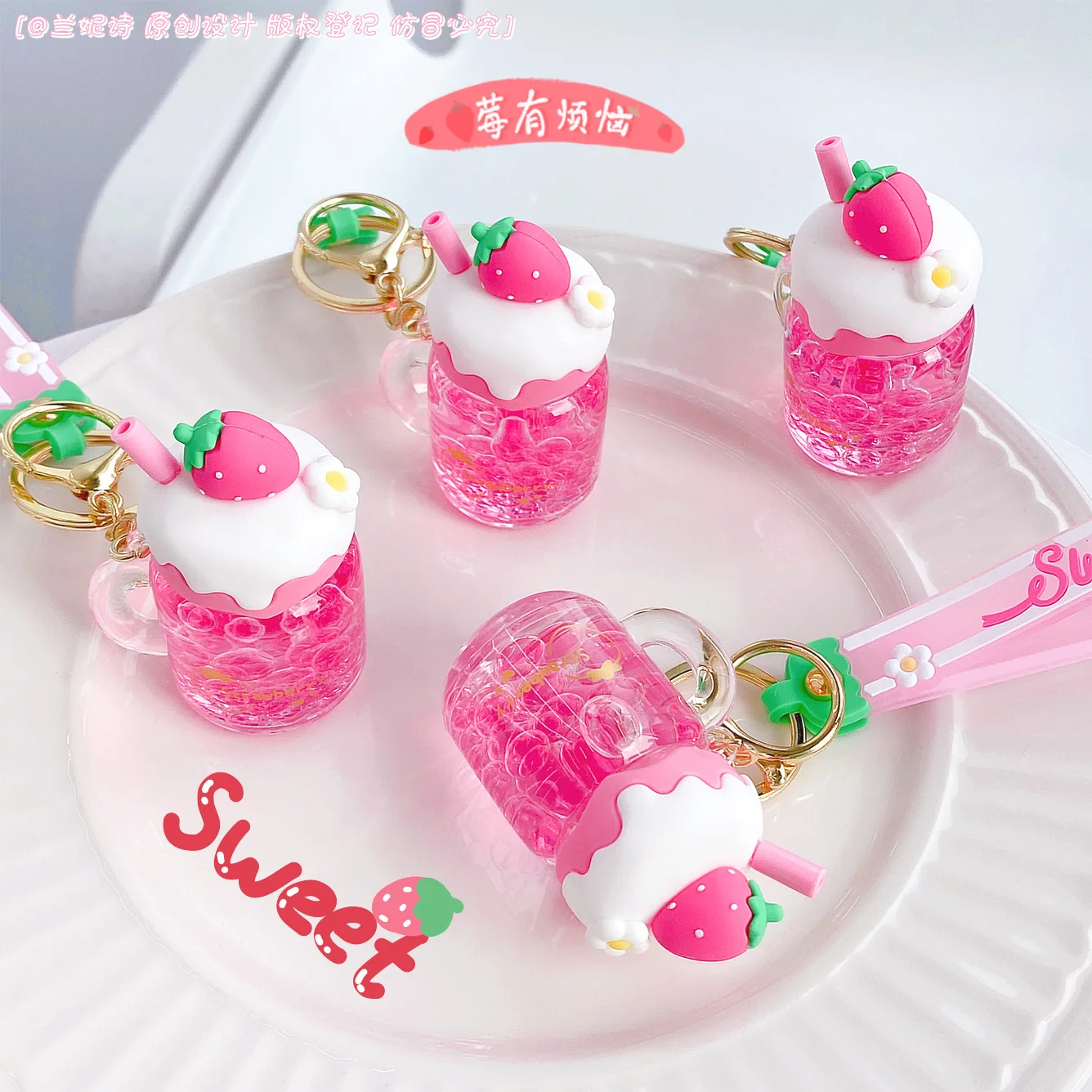 HOT Pink Strawberry Transparent Floating Bottle Liquid Filled Keychain Female Cute Acrylic Doll Key Chain Bag Car Pendant