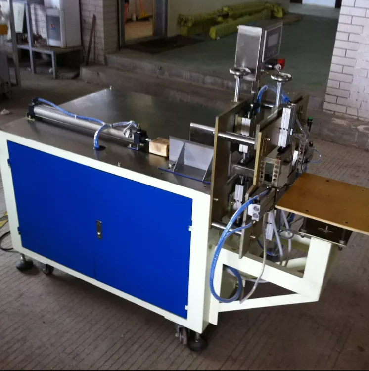 low price high quality semi automatic baby diaper packing machine