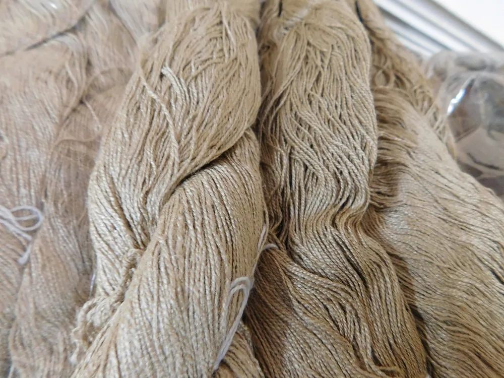 recycled premium quality pure white banana silk yarn made from recycled rayon and viscose waste ideal for dyeing