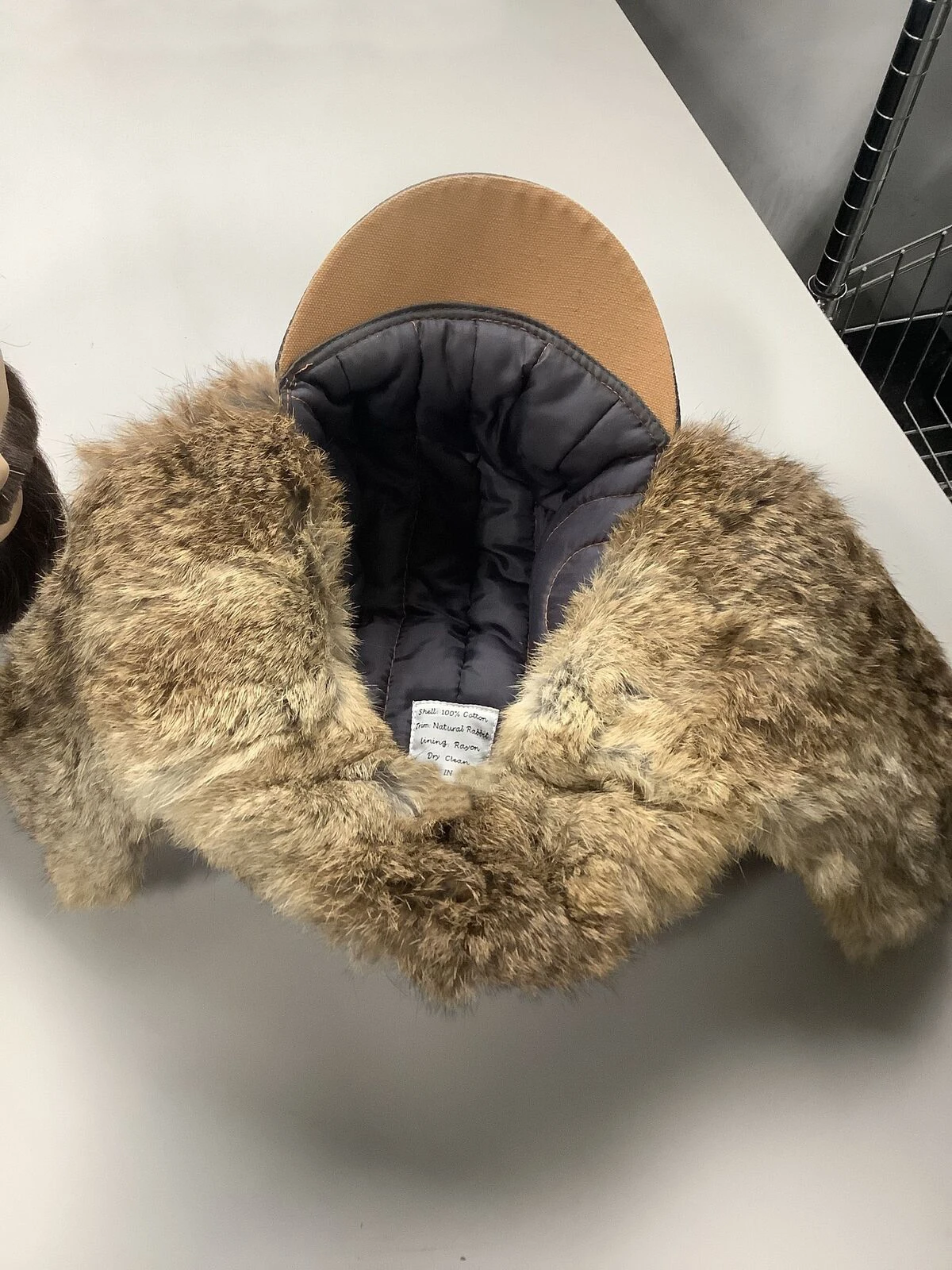 Fully customable wool Russian Aviator cap for men with warm fur lining and adjustable chin strap for winter and skiing