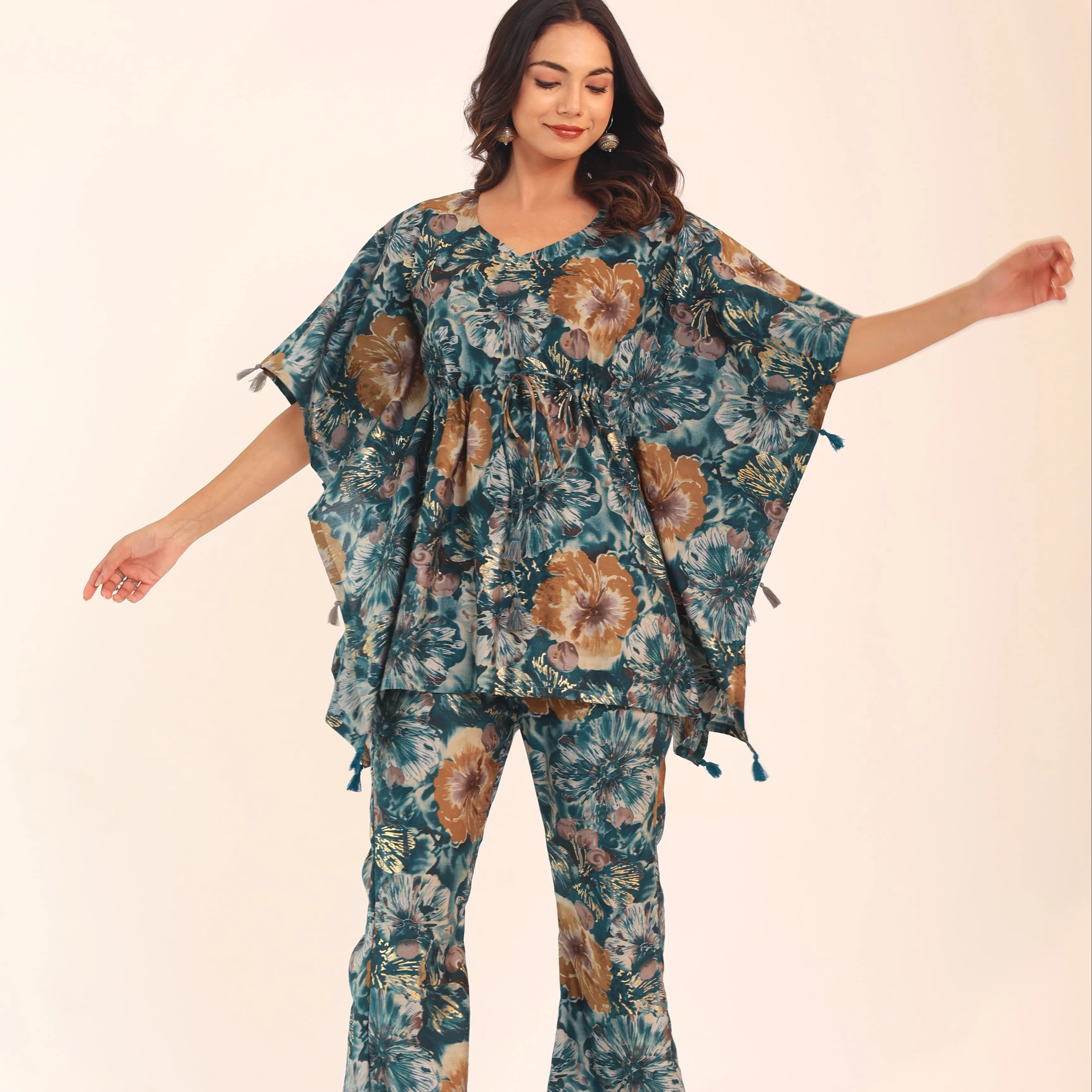 The meticulously designed top & pant combination seamlessly blends fashion-forward aesthetics with ease of wear perfect choice