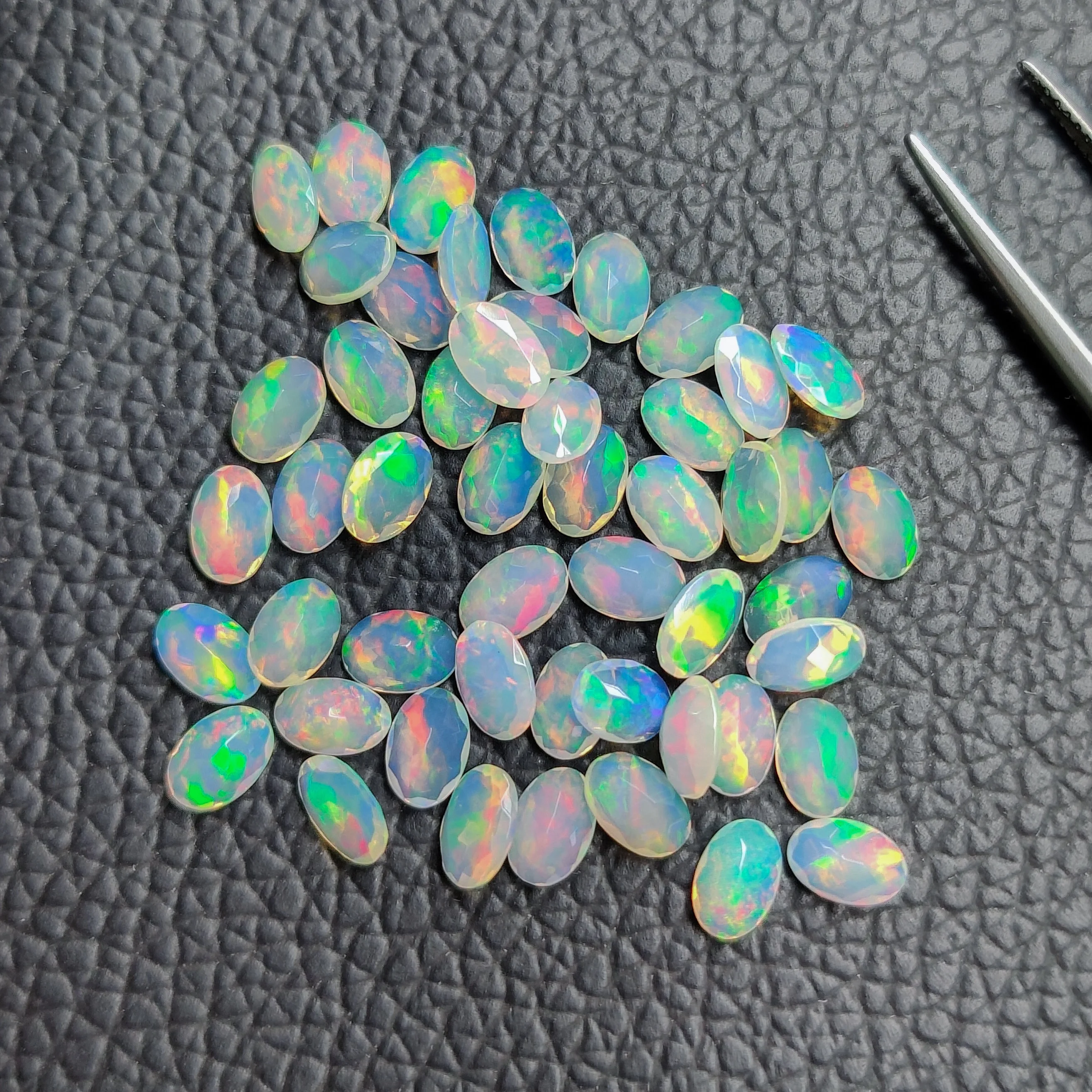 Beautiful Color Finest Top Quality Faceted Oval Cut 6mm 8mm Ethiopian Opal Welo Multi Fire Polished Gemstone For Jewelry Making