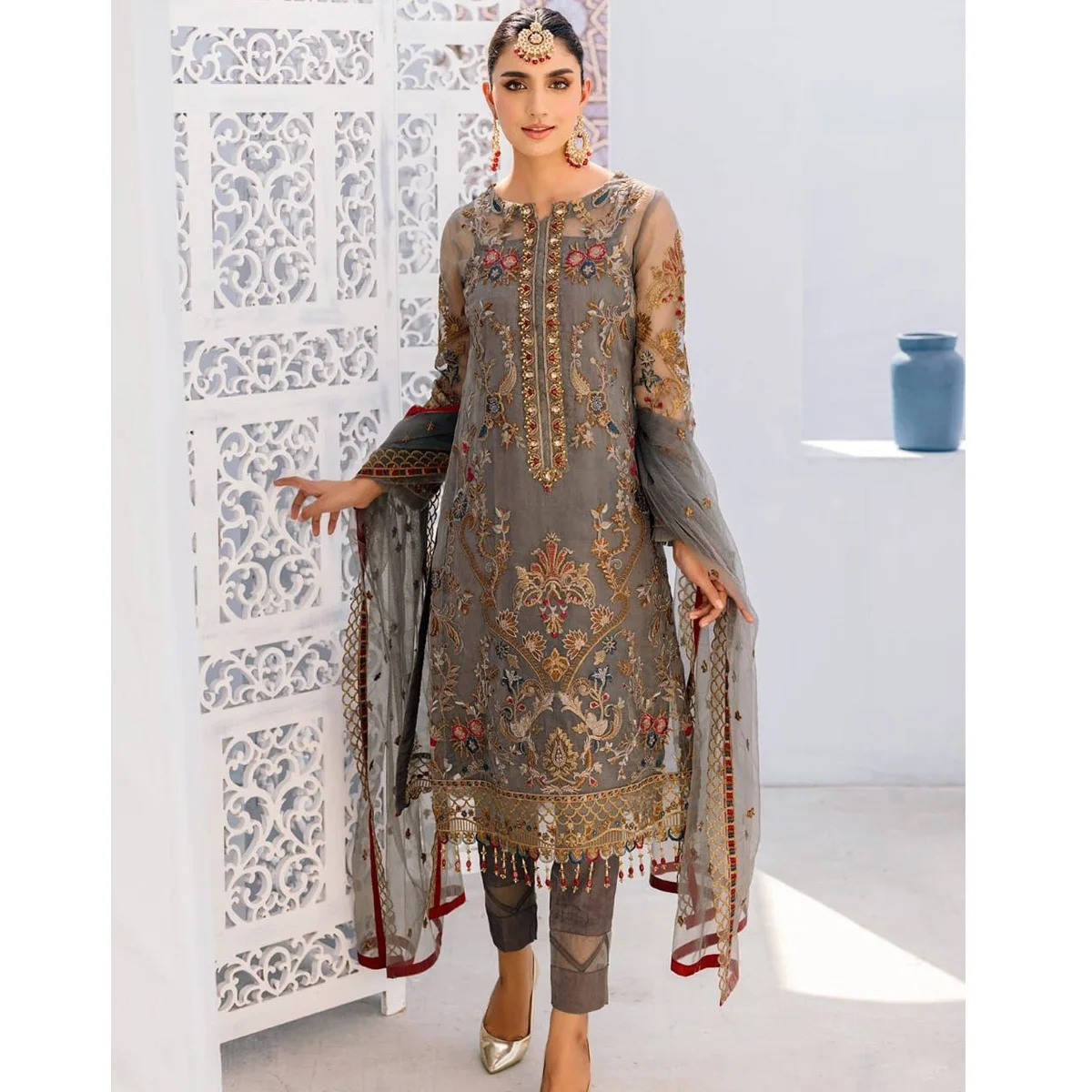 Pakistani/Indian party wear and marriage dress for women at Organza Fabric Embroidered Along With Net dupatta and Malai Trouser