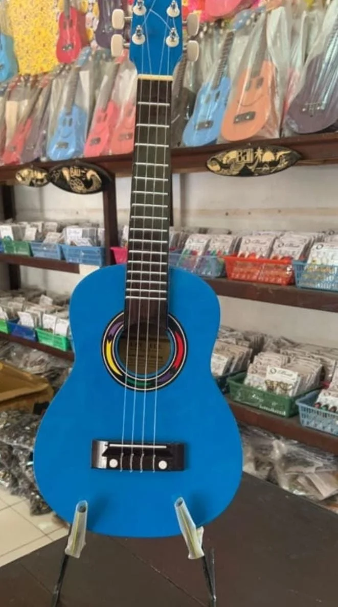Nice product customized logo and design wholesale available in may colors wooden Bali cheap Ukulele