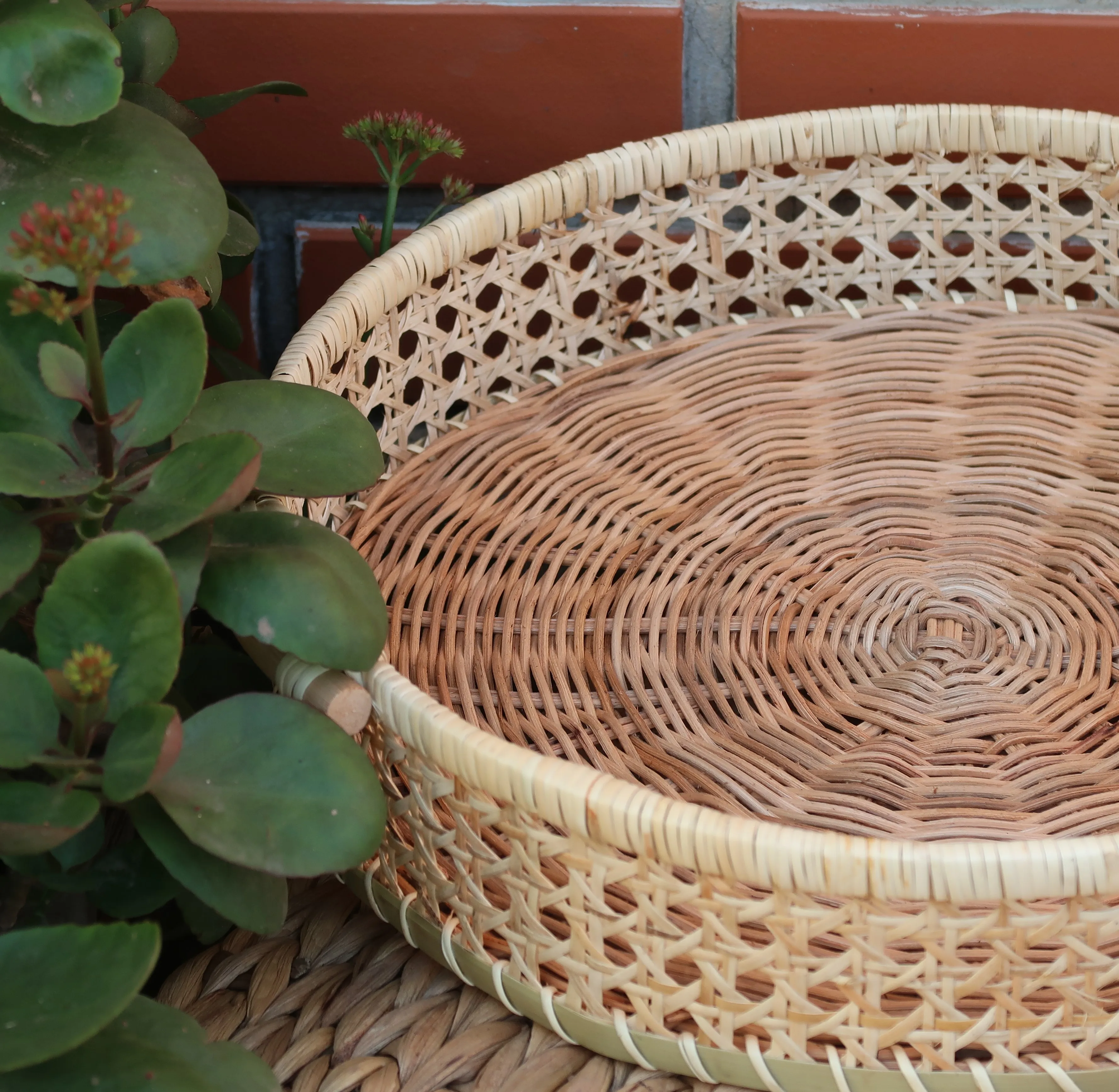 Versatile rattan fruit basket, handcrafted in Vietnam, perfect for storing fruits or as a decorative piece made in Vietnam