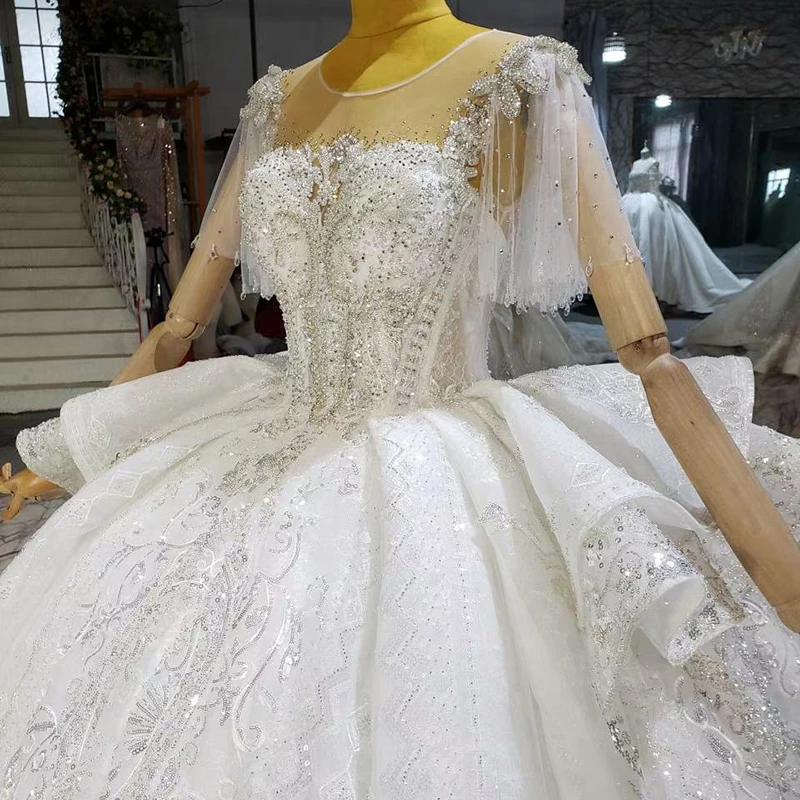 Htl2315 Custom Elegant Fringed Bridal Wedding Dress Beaded Embroidered Lotus Leaf Gauze Dress