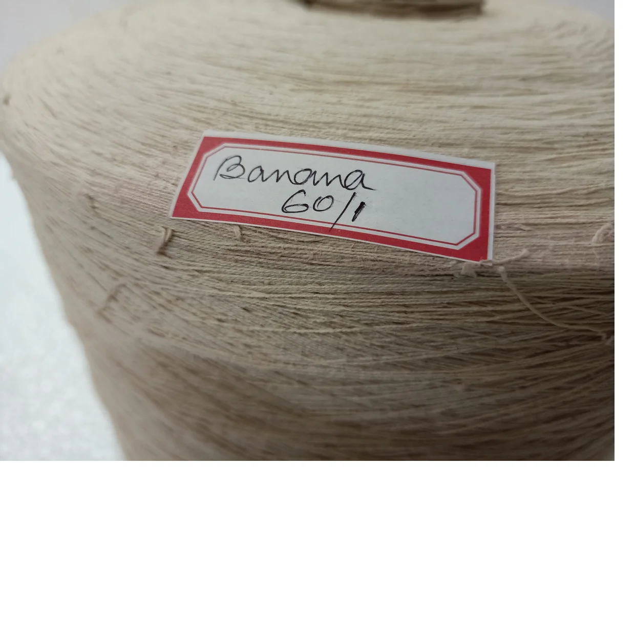 natural banana fiber cones in count 60/1 NM available in 2 Kg Cone ideal for textile spinners and weavers suitable for resale