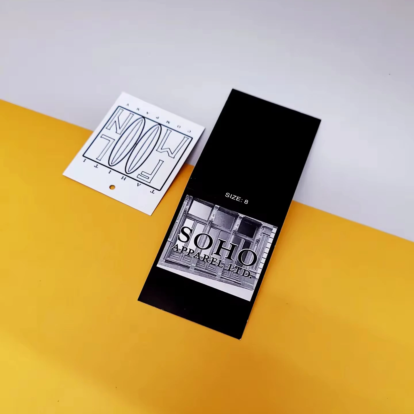 MORI seal tag with luxury swing paper embossed hang tags with steel ring eyelet custom  rope fashion embossed hang tag string