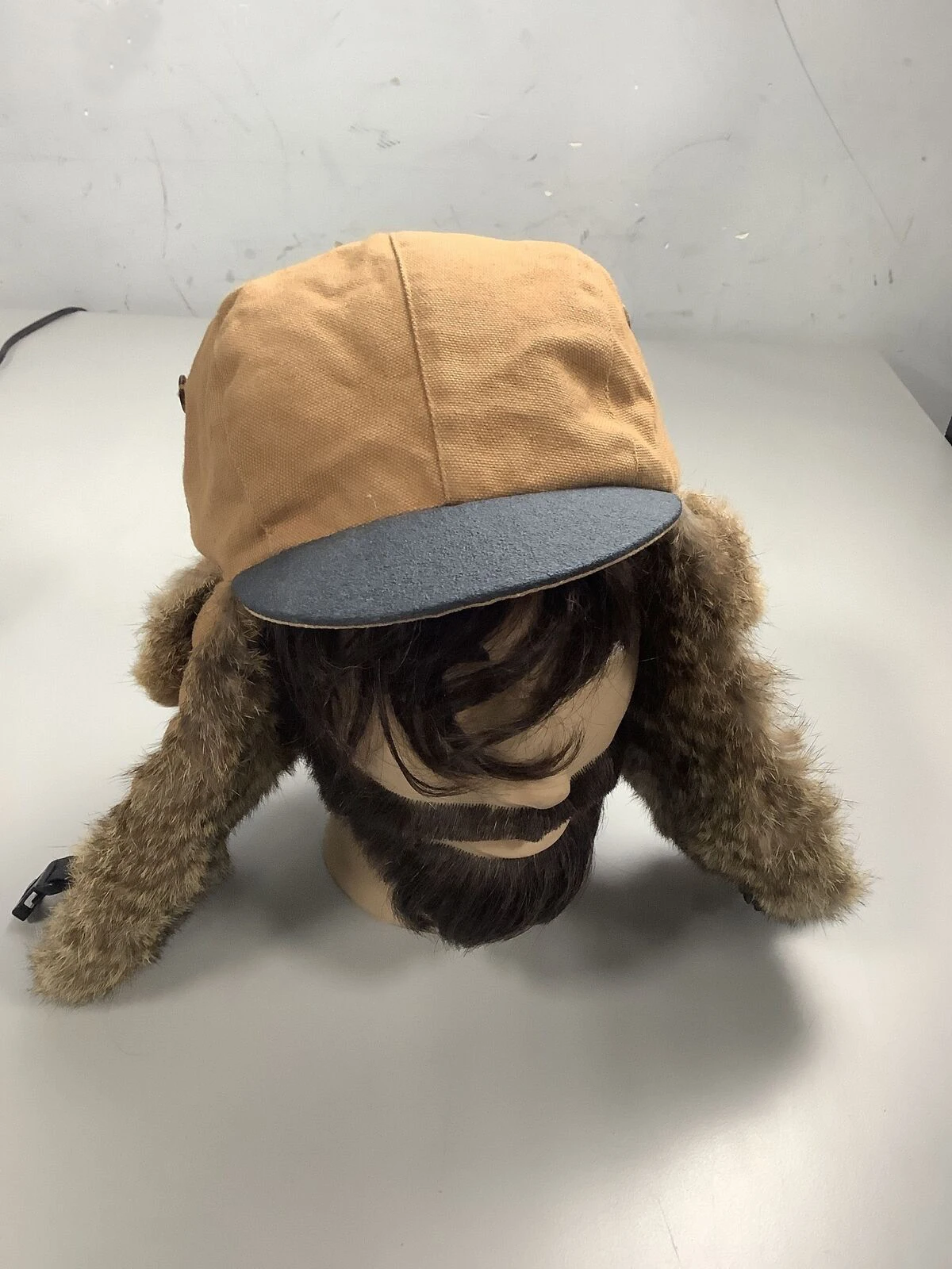 Fully customable wool Russian Aviator cap for men with warm fur lining and adjustable chin strap for winter and skiing