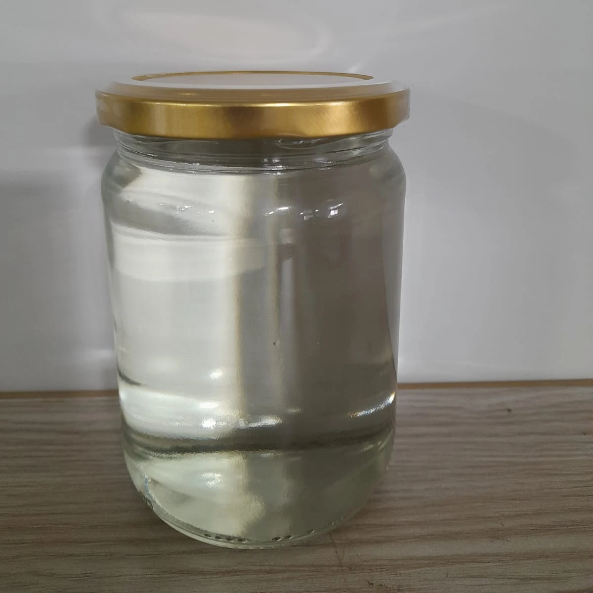 Pure Extra Virgin Coconut cooking oil packed in glass jars and bulk packing from Sri Lanka use for Cooking and dressing