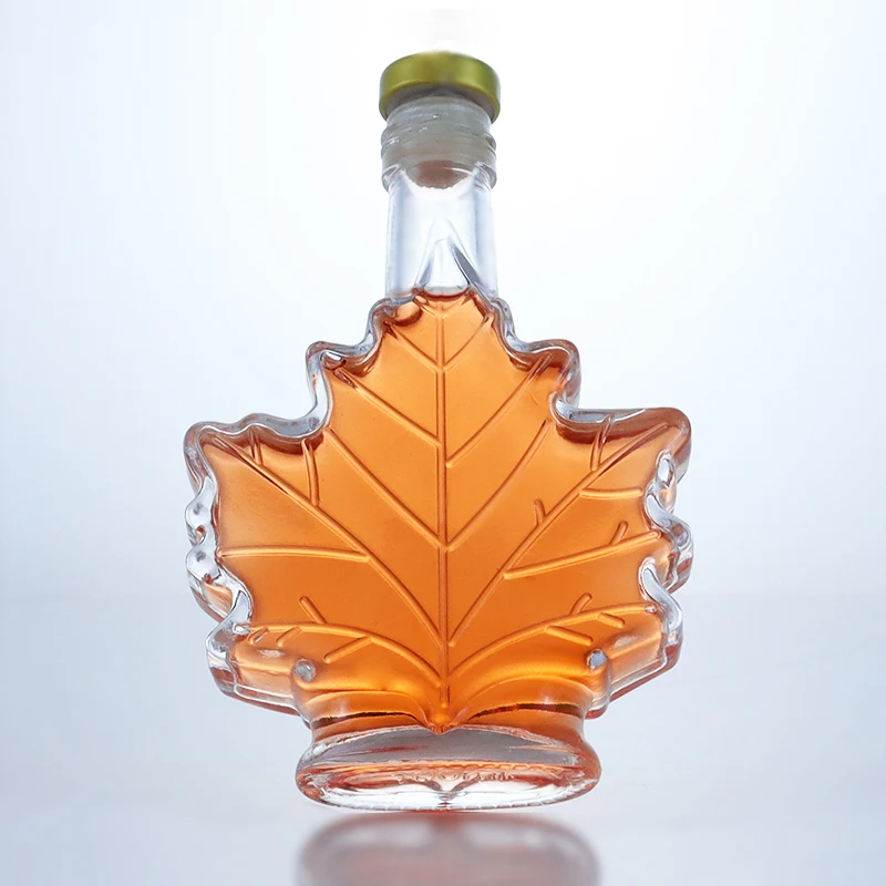 500 ml maple leaf shape transparent glass bottle with screw cap for gin whiskey vodka tequila rum