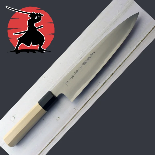 Gyuto Knife double edge blade Japanese knife crafted by a skilled blacksmith using an ancient Japanese manufacturing method