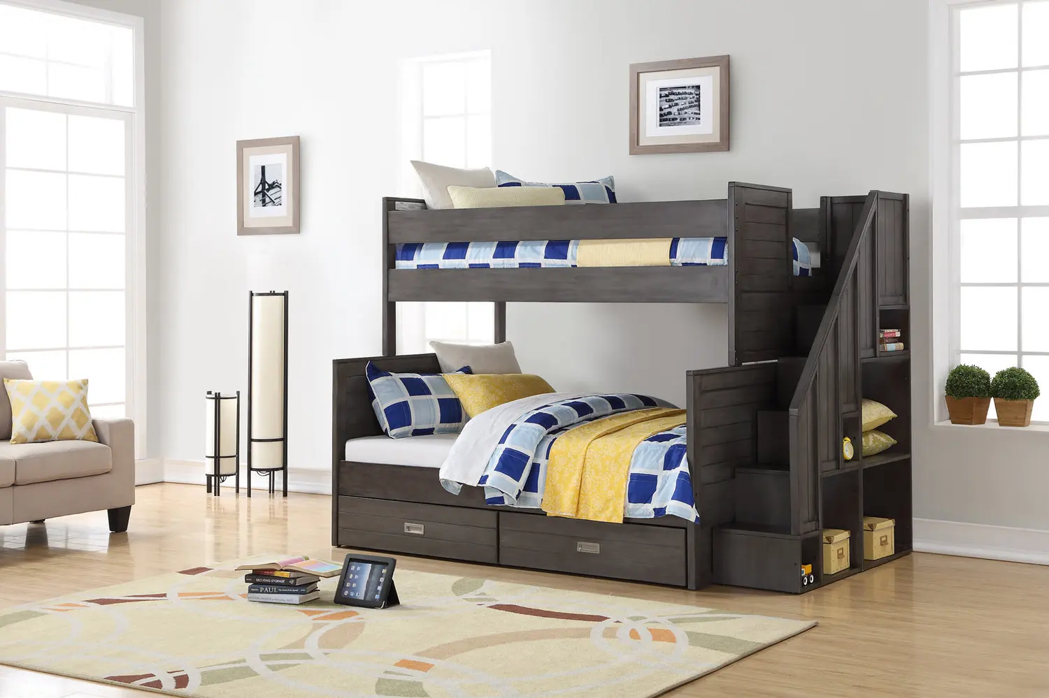 The Dylan bunk beds with stairs feature 6 open-concept bookshelves on the end and manages to retain a classic look