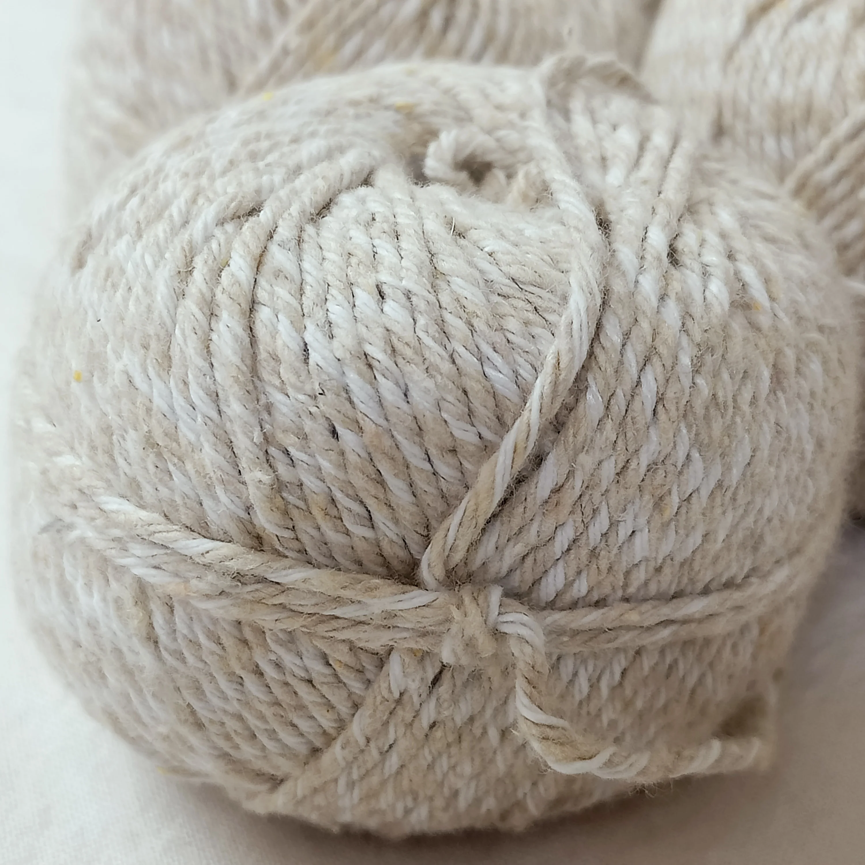 natural nettle fiber yarn  made with bleached and unbleached fibers available in 50 gram and 100 gram balls