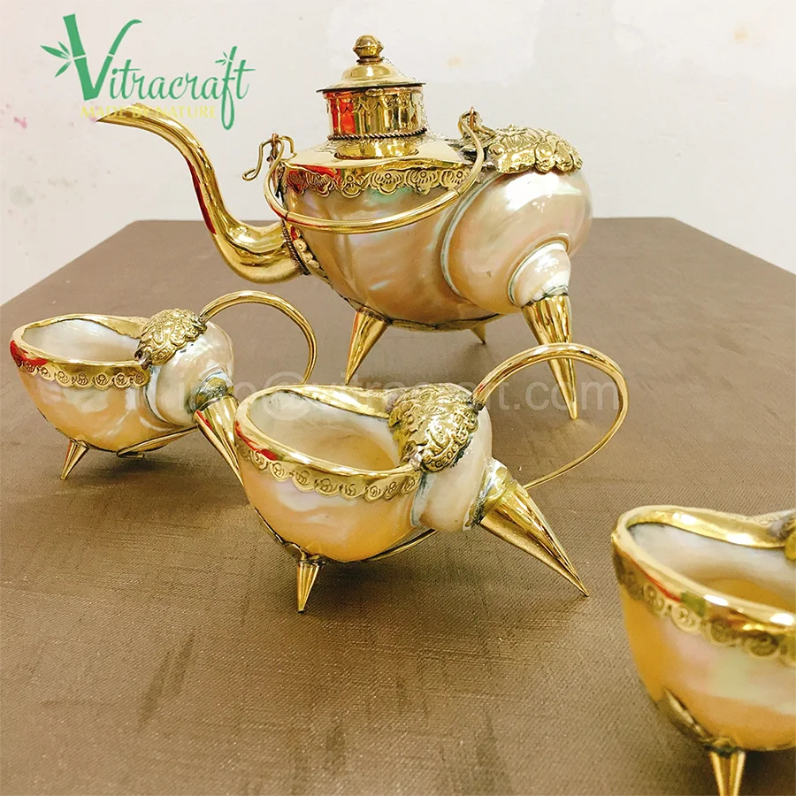 Handmade tea set. Made from Premium nautilus shells, Combined with a copper metal. Create unique products. meaningful gift