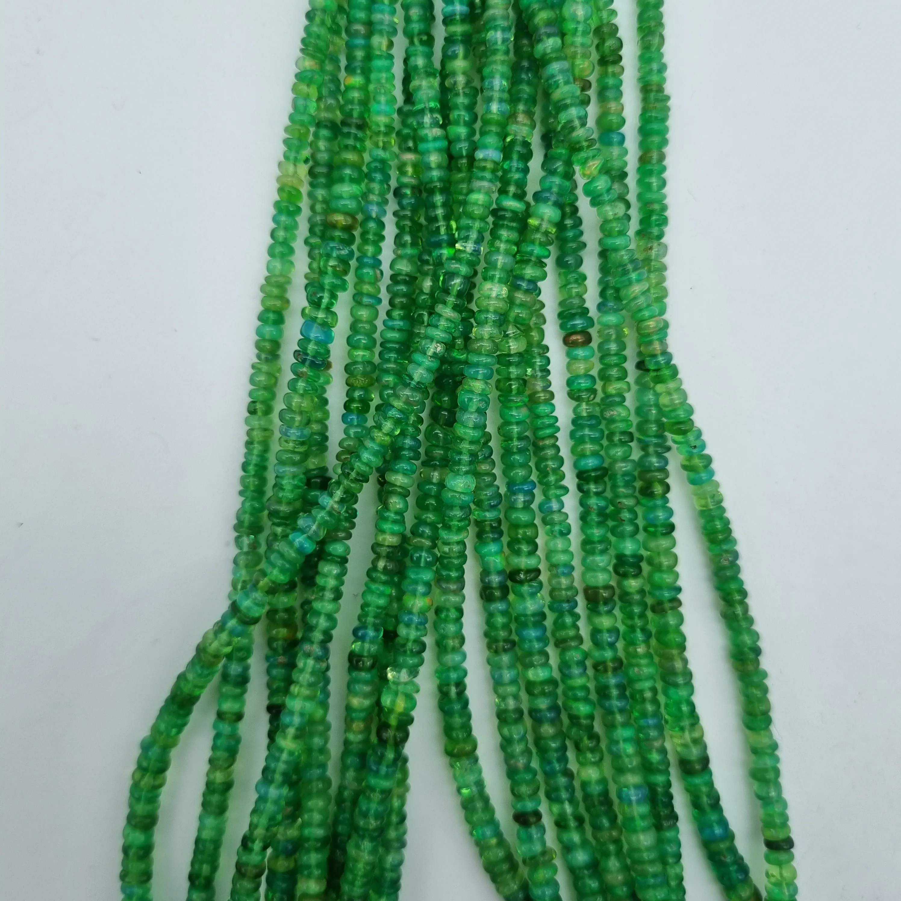 Most Selling  AAA Green Colour Ethiopian Opal Smooth Rondelle  Beads At Best Price By Factory For Jewelry