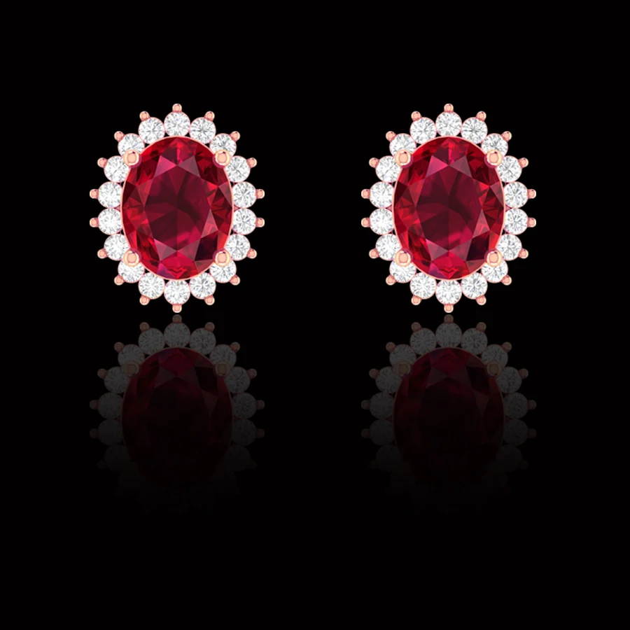 A beautiful pair of cushion cut Intense Red ruby earrings. 5 carats of Ruby 1.8 carats of white round brilliant cut diamonds
