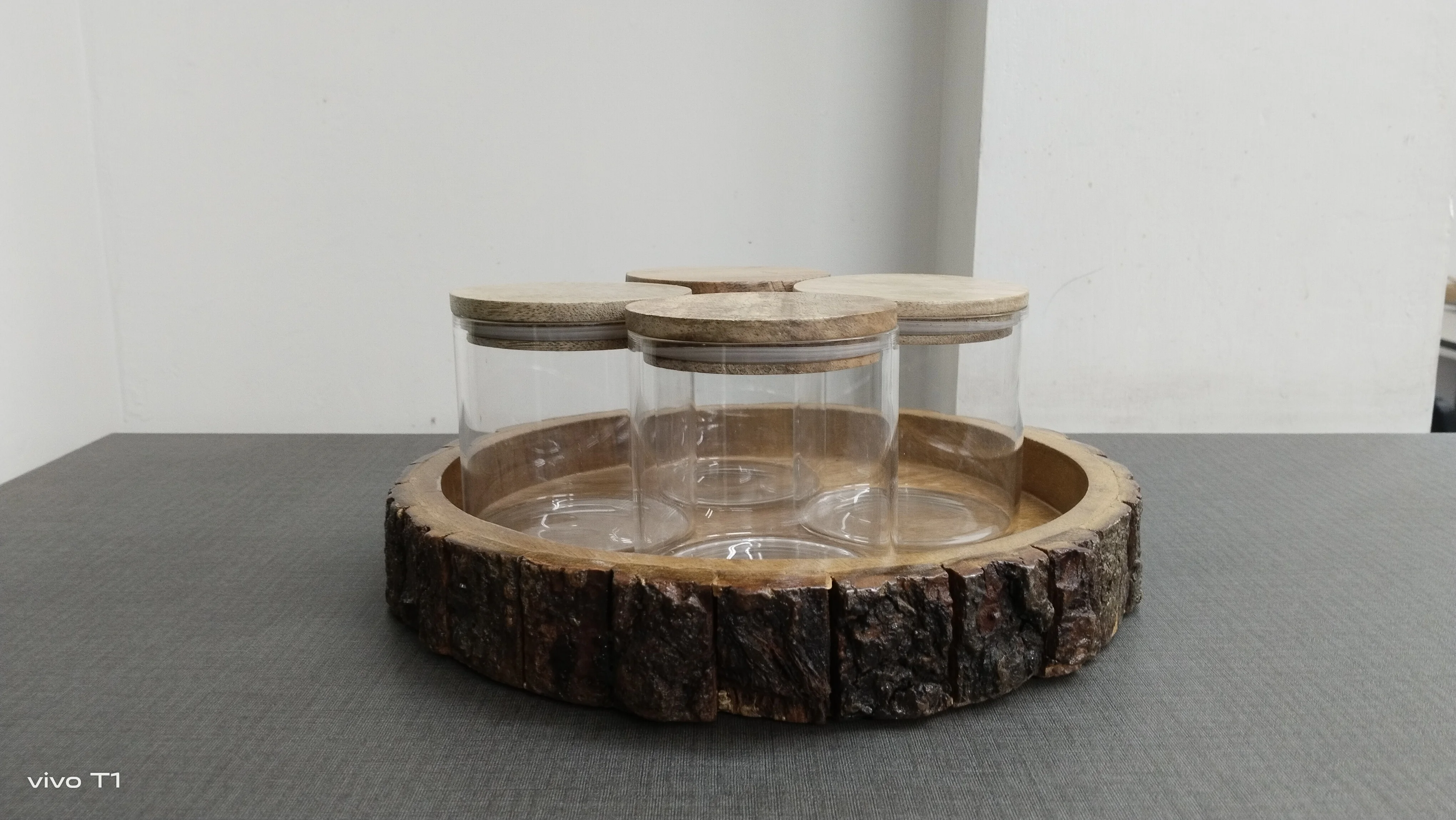 Top Quality Serving Wooden Tray with Borosilicate Glass Jars Set of Four Round Shape Wooden Tray used in Home Kitchen
