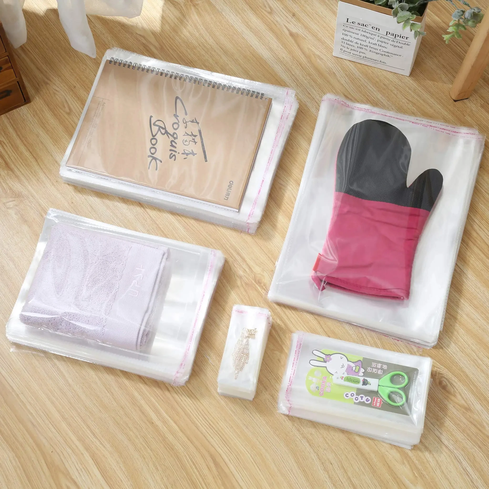 Transparent self-adhesive sealed plastic packaging bag, resealable cellophane OPP fresh-keeping bag, reusable gift bag