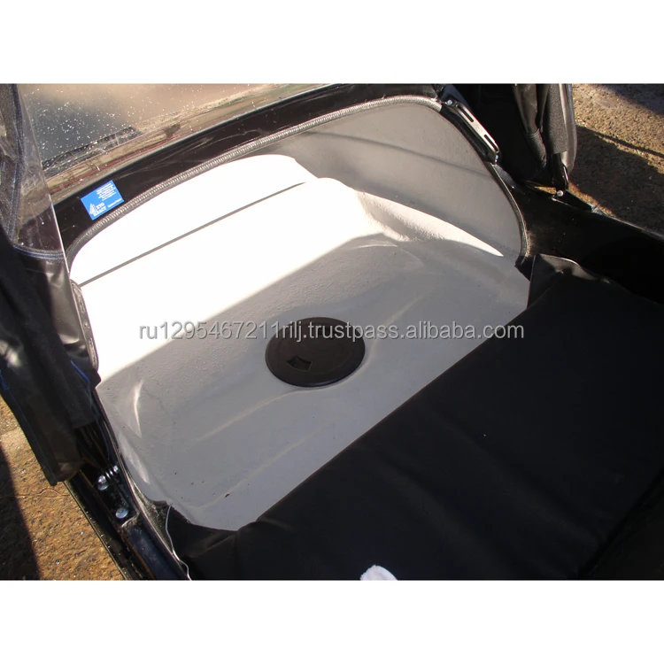 Snow-mobile trailer passenger fiberglass body mounted on steel frame of the suspension system and awning device