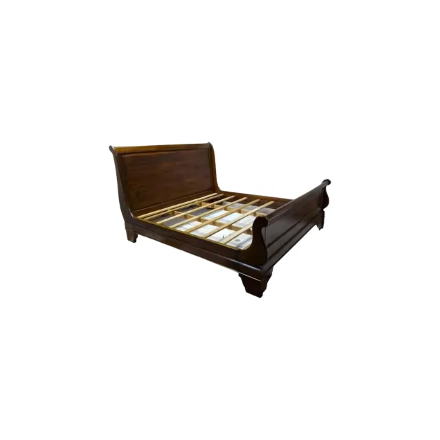 The Mahogany Sled Bed is crafted from solid Indonesian mahogany, exuding timeless elegance and beauty