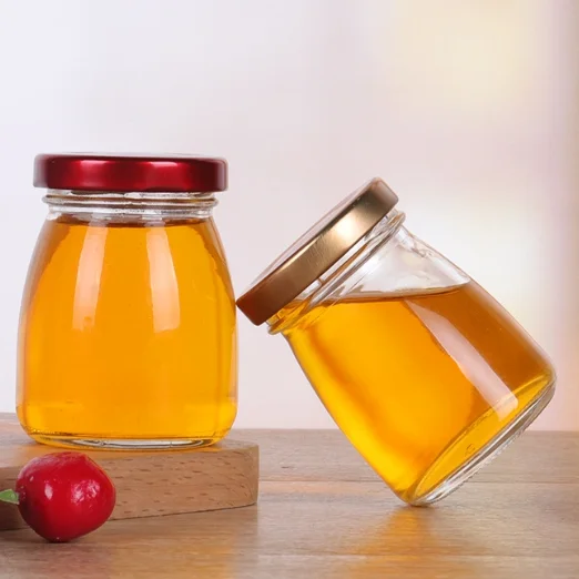 Nice price food empty clear round glass jar container for honey bird nest jar with lid