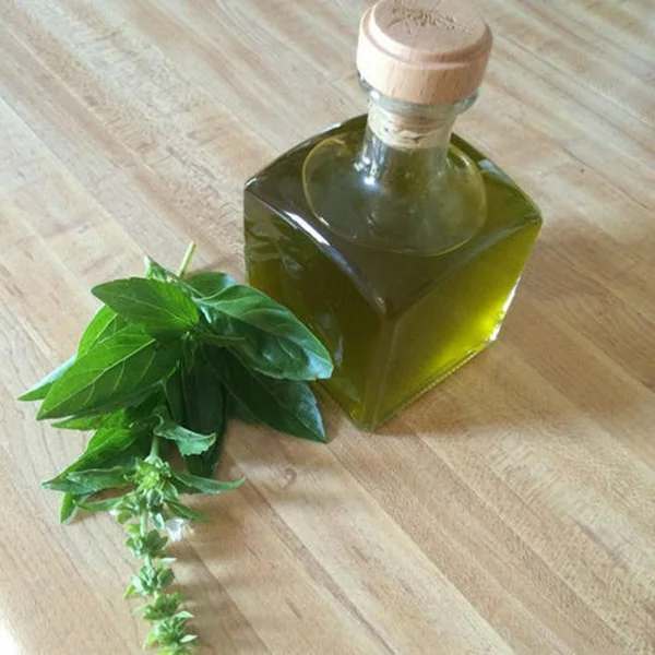 Basil Essential Oil Wild-Cultivated Herbal Extract in Liquid Form Packed in Plastic Glass or Bottle with Seed Part Used