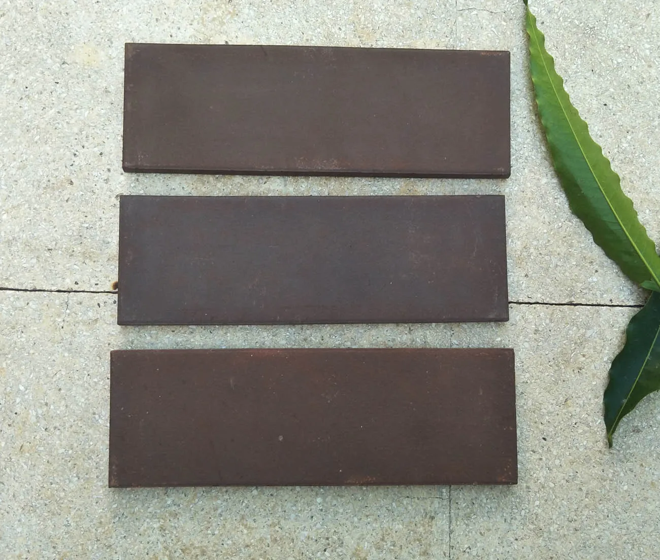 Brown clay terracotta wall cladding and clay floor tiles for garden indoor outdoor floor and wall brick covering cladding