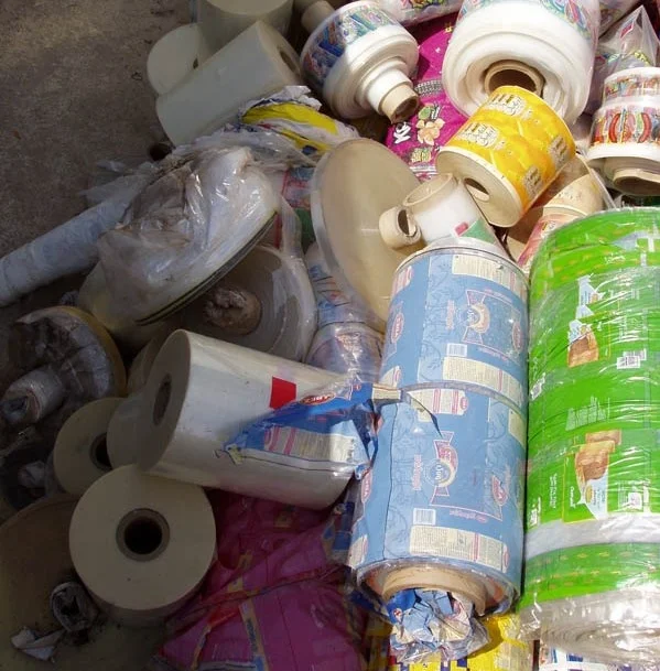 BOPP (PP) PLASTIC FILM ROLLS (MIX COLOR) IN BIG BAGS SCRAP / WASTE / STOCK FOR RECYCLING