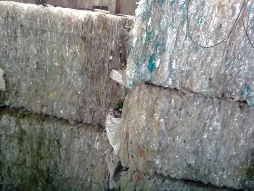 Buy Fresh Quality Pet Flakes factory PET Bottle Scrap clear hot washed PET Flakes for bottle and fiber Cheap Price