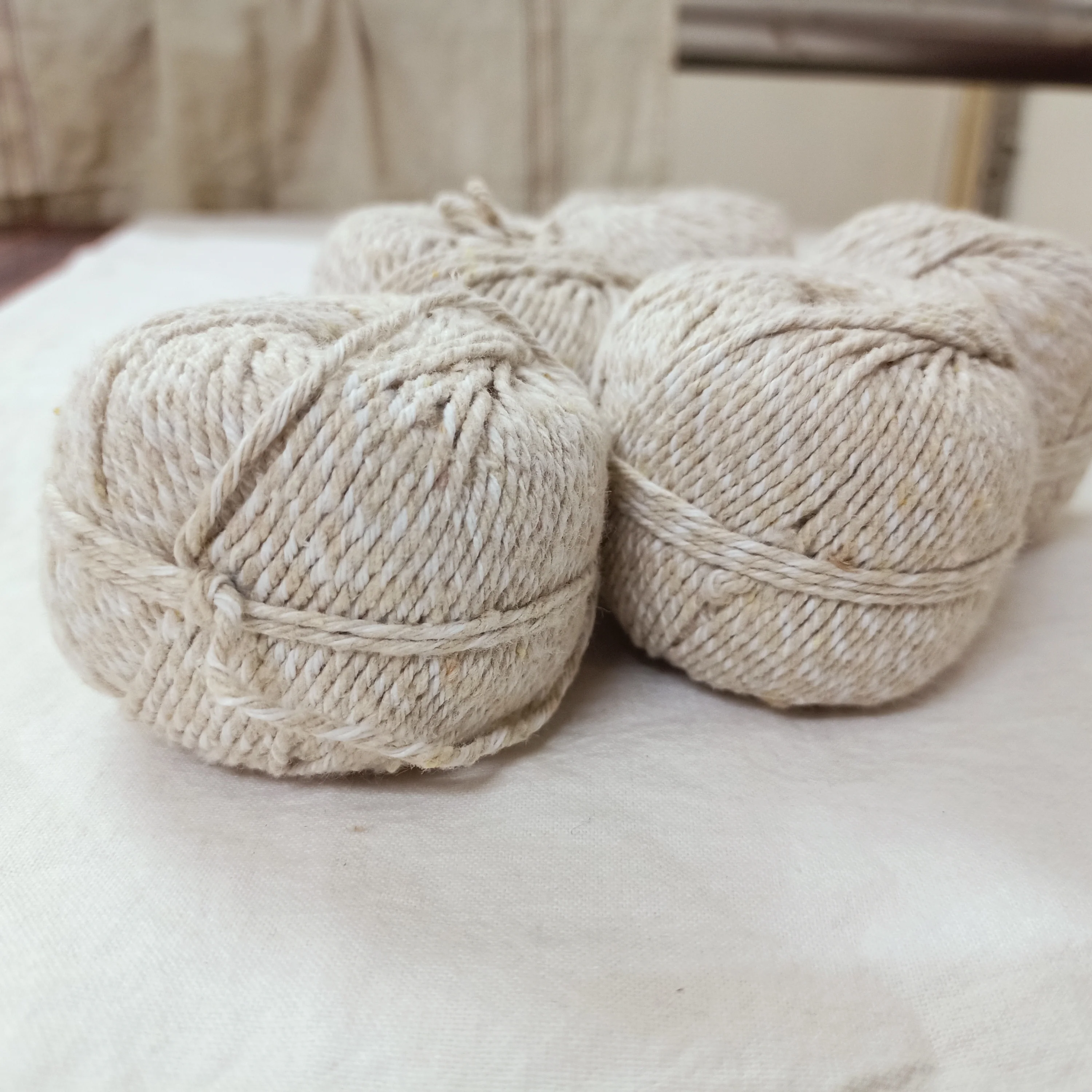natural nettle fiber yarn  made with bleached and unbleached fibers available in 50 gram and 100 gram balls