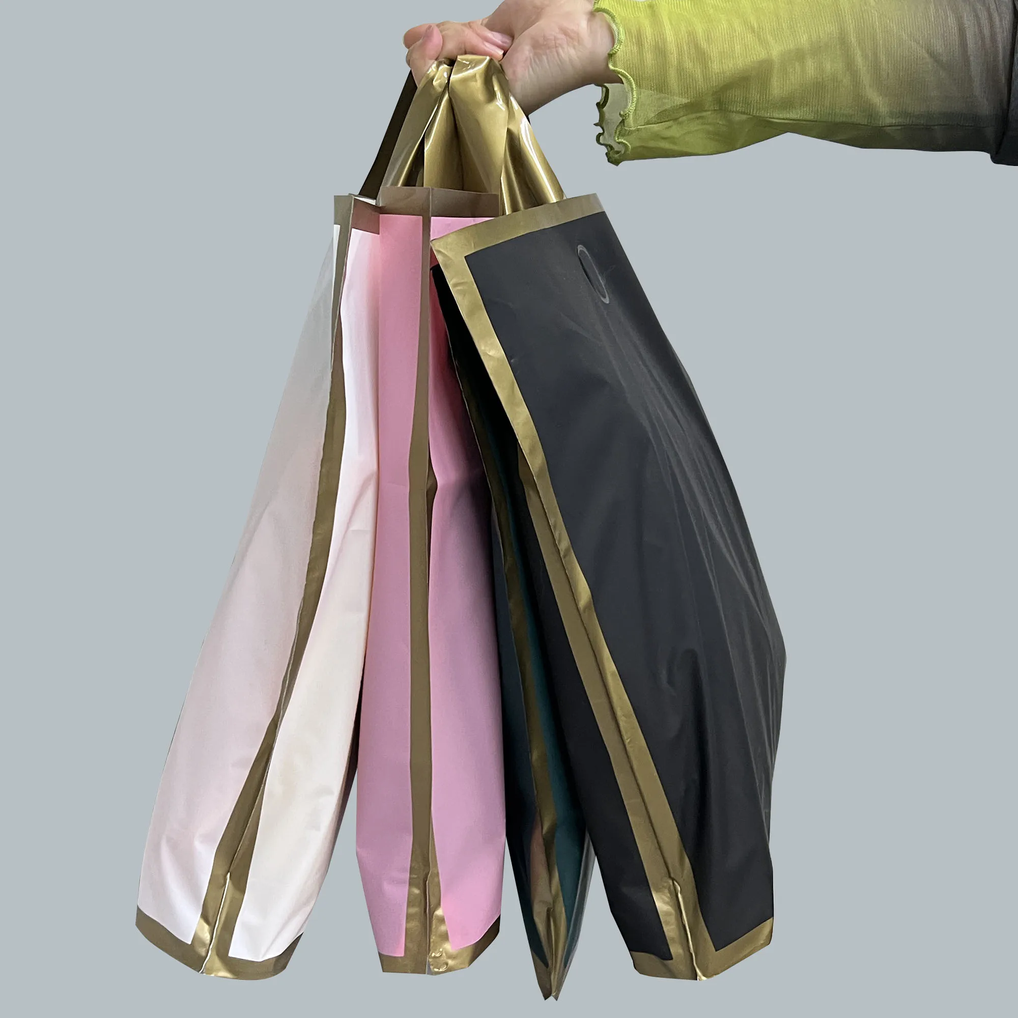 Customize Garment Shopping Bag Biodegradable Soft Loop Handle Plastic Bag With Custom Logo For Clothing Packaging