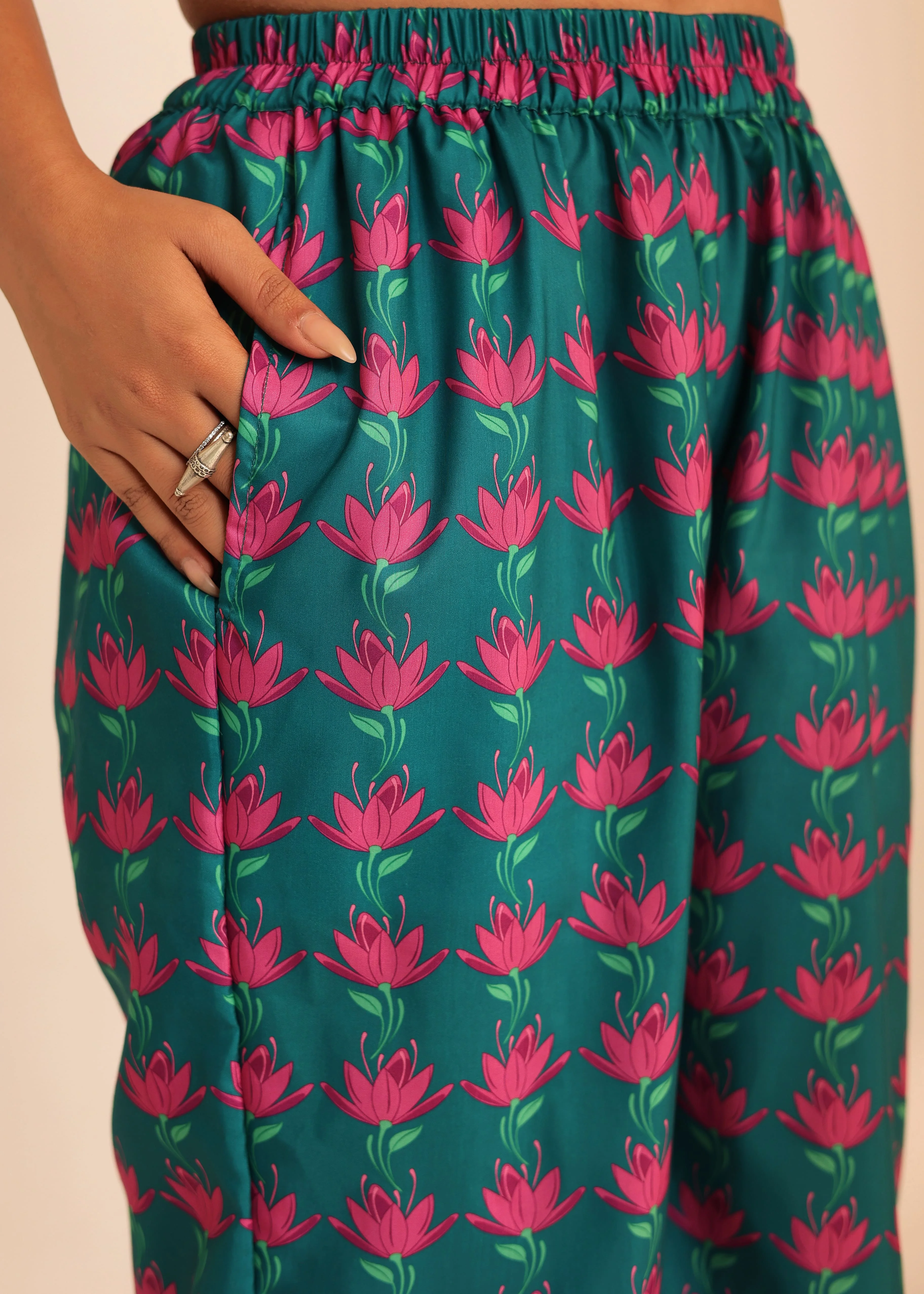 The Meticulously Designed Top And Pant Combination Complete With A Stylish Waist Tie, Offers A Perfect Blend Of Fashion