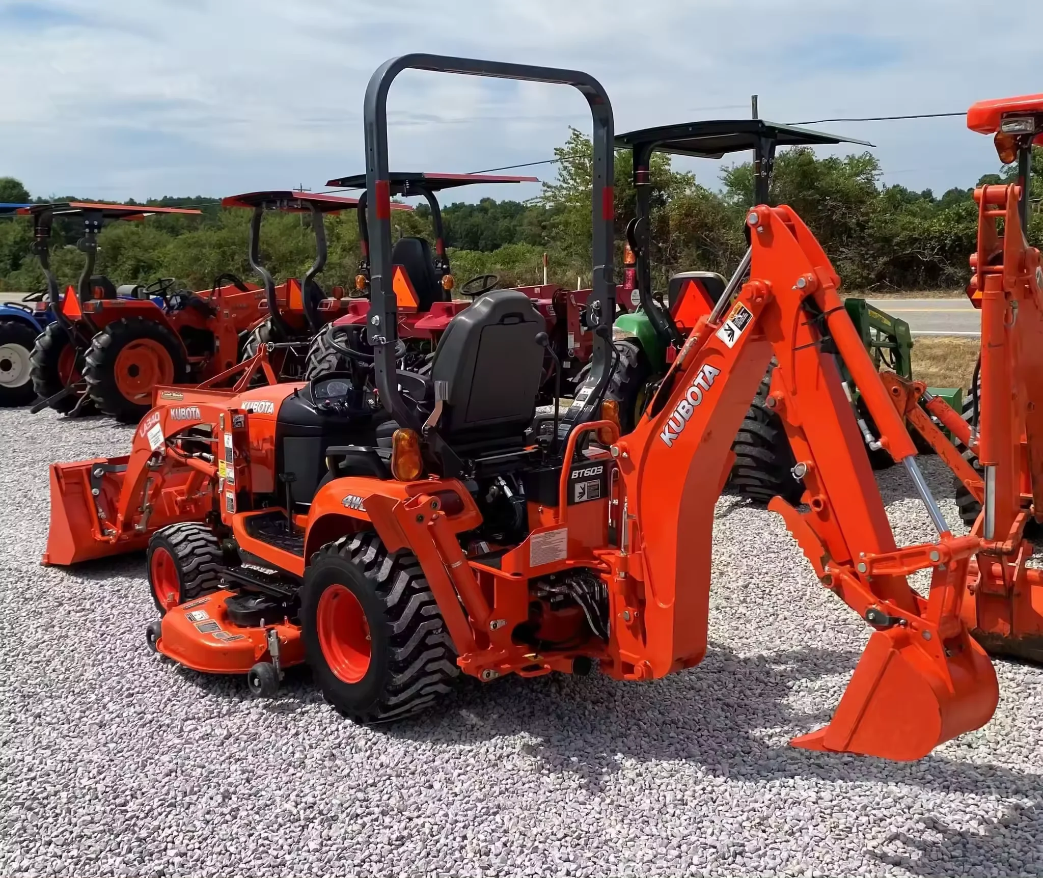 USED MINI KUBOTA BX-23S backhoe loader/ SMALL loader WITH MOWER ATTACHED all in good condition