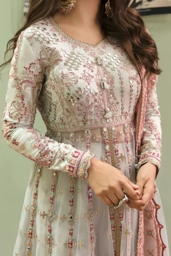 stylish Pakistani & Indian dresses, featuring top-quality and heavy embroidery for exquisite partywear.