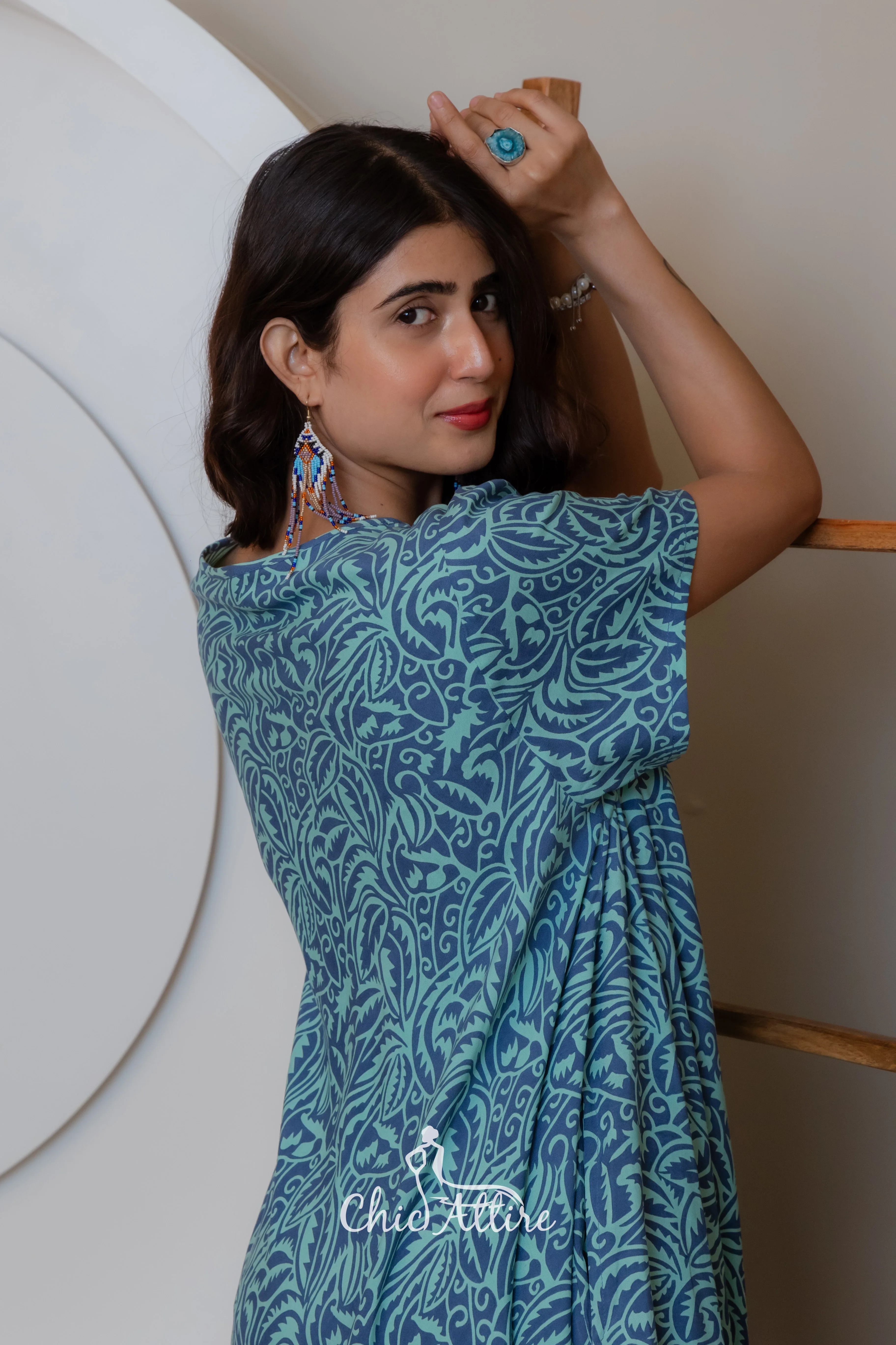 Stylish Teal White Swirl Pattern Midi Dress Ruffled Hemline Short Sleeves Neckline Comfortable Light Flowy Fabric Casual Summer