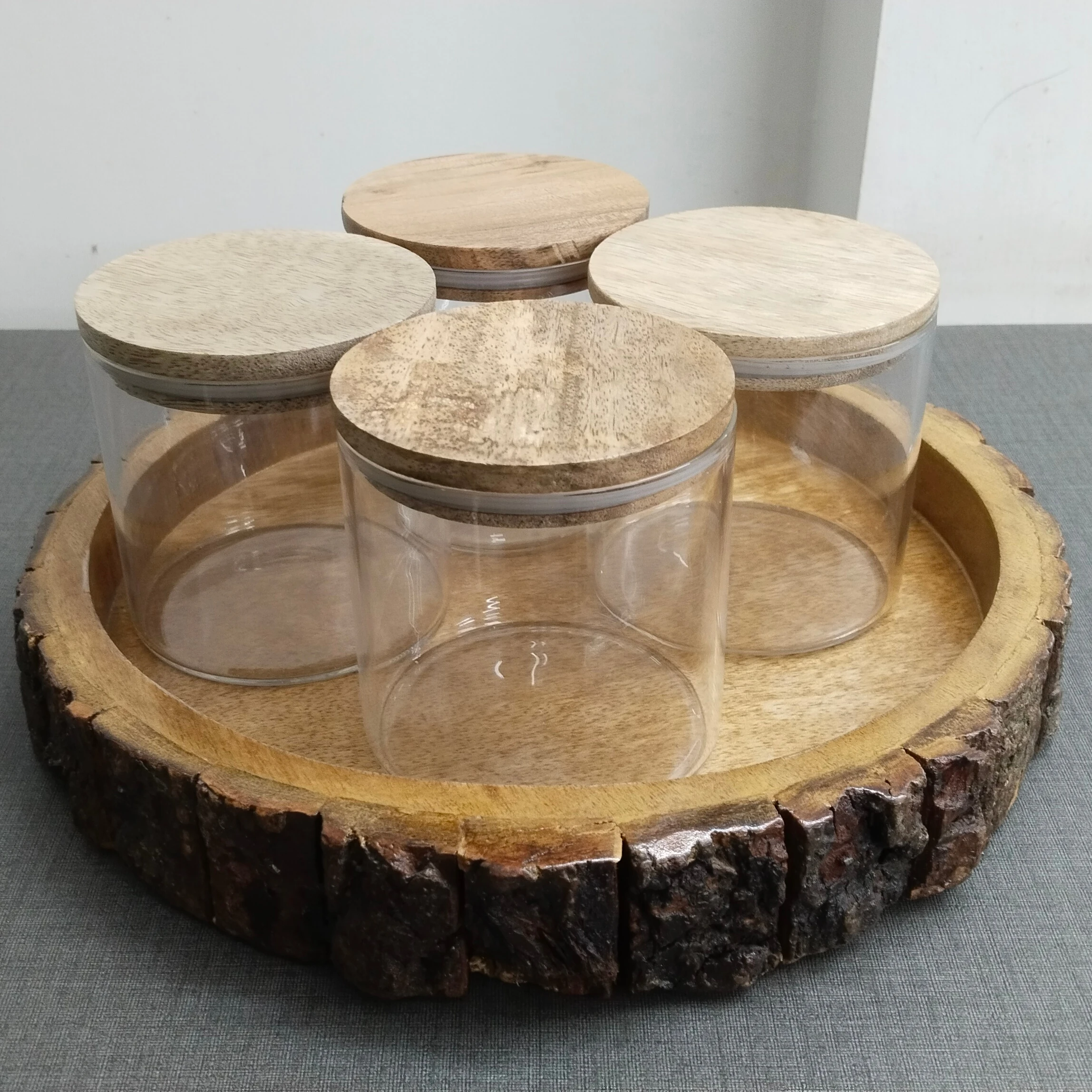 Top Quality Serving Wooden Tray with Borosilicate Glass Jars Set of Four Round Shape Wooden Tray used in Home Kitchen