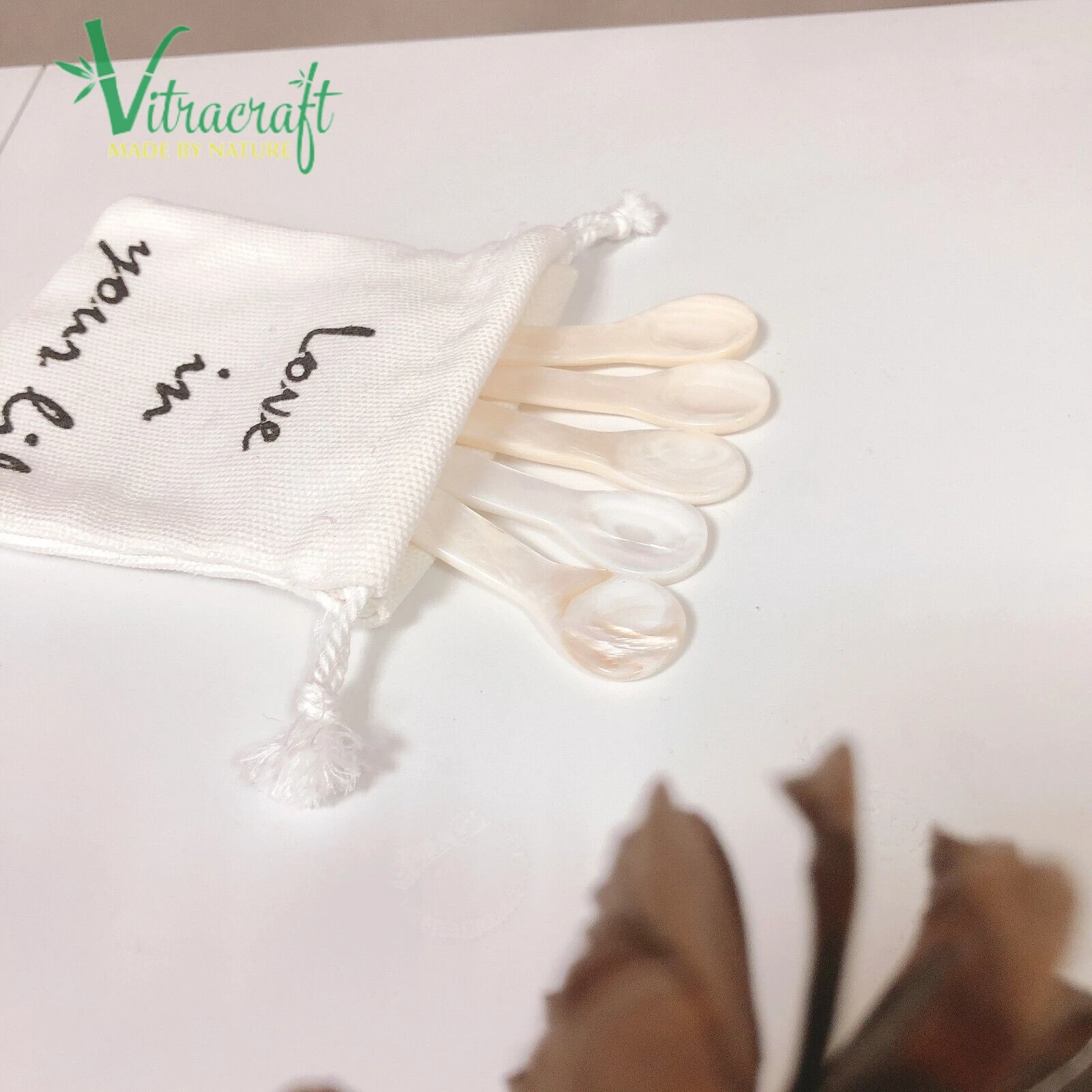 Super Cheap Price. A set of 100 natural white mother of pearl spoons Handmade products from Vietnam Size 6cm