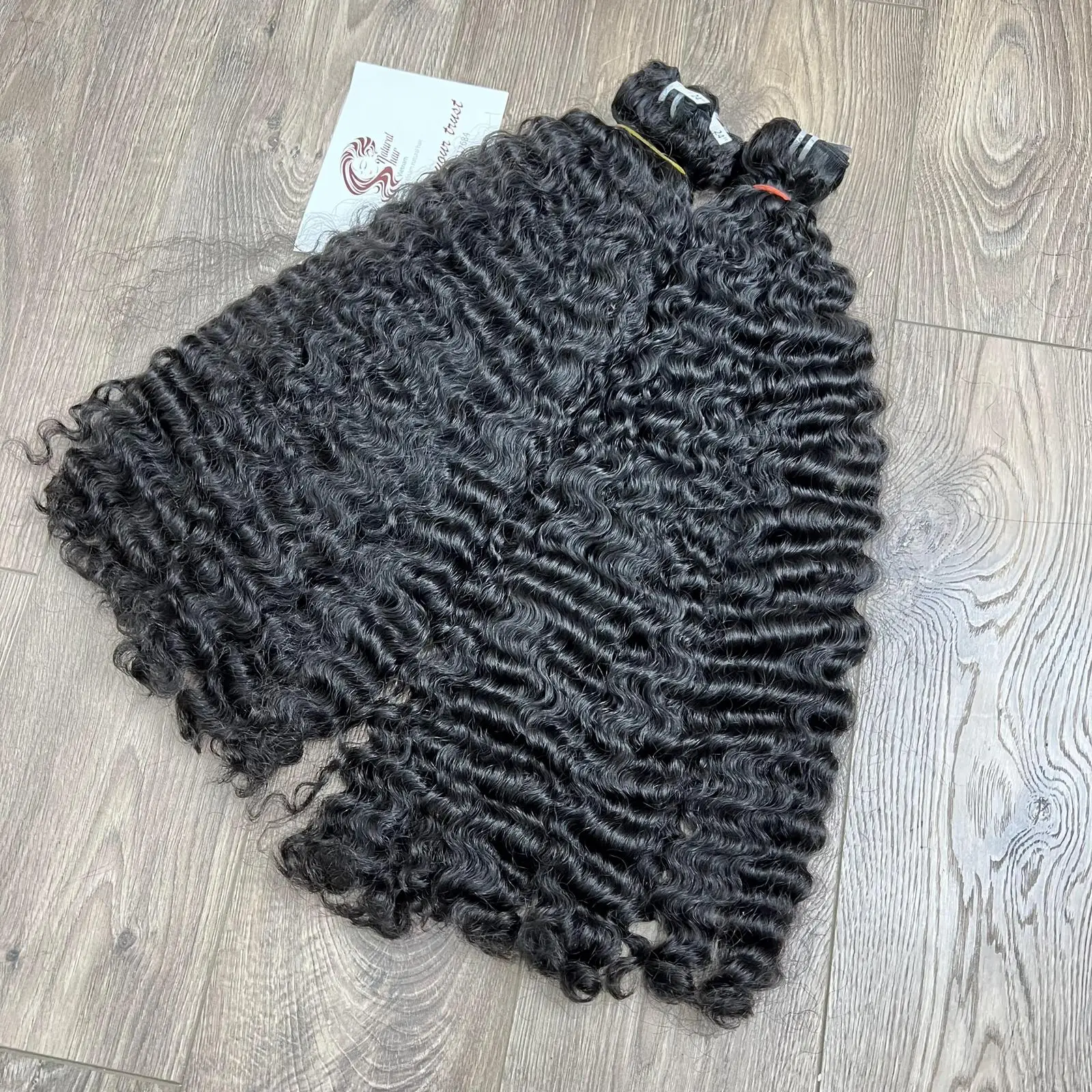 Супер двойная вытянута объемная бирманская кудрячая натуральная черная 100% необработанные натуральные вьетнамские человеческие волосы оптовая цена