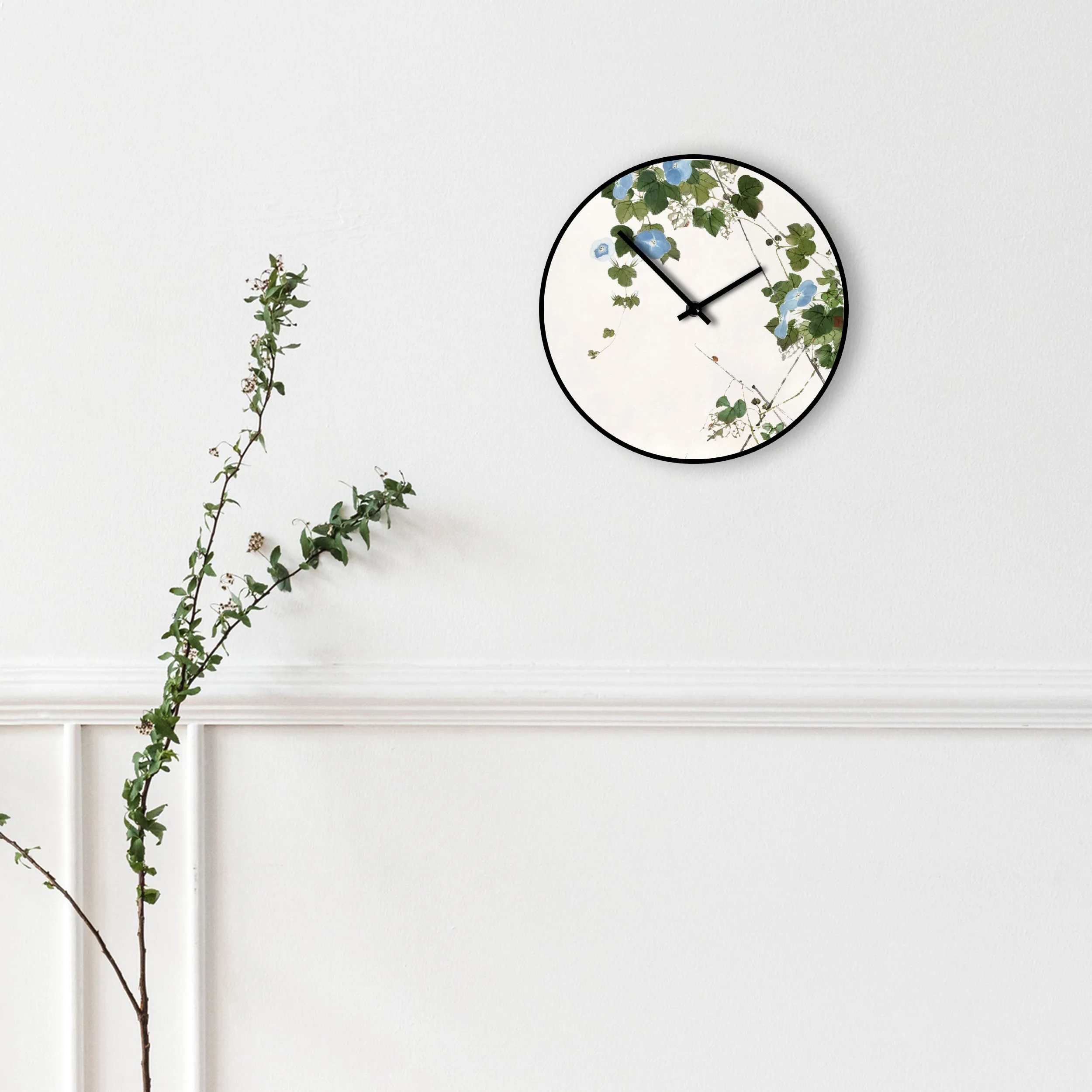 Small round wall clock with a little ladybug decoration