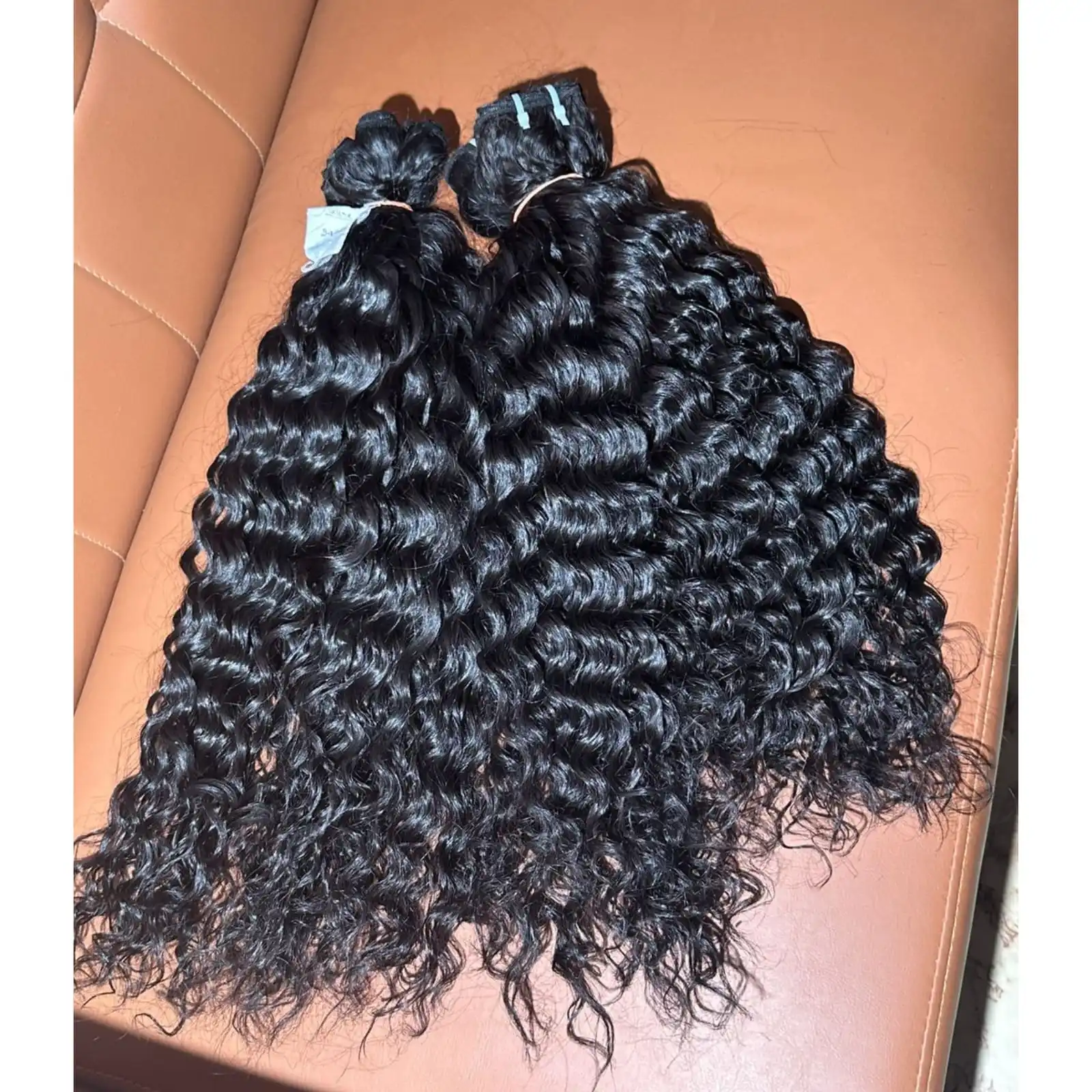 INDIAN NATURAL CURLY SOUTH TEMPLE HAIR EXTENSIONS CAN BE BLEECH UP TO 613 BLONDE