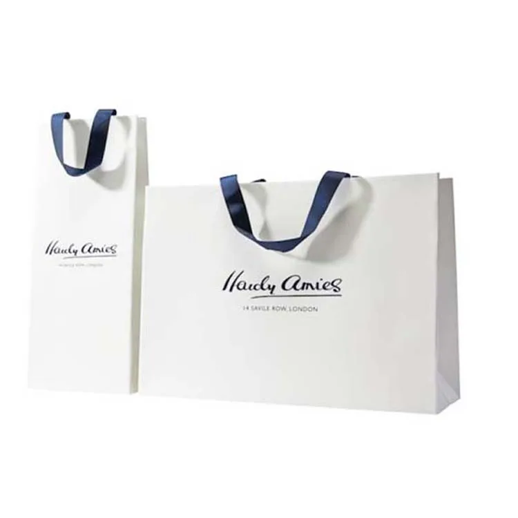Customized logo white printed promotional paper foiled beachwear clothes packaging shopping bags with brand name