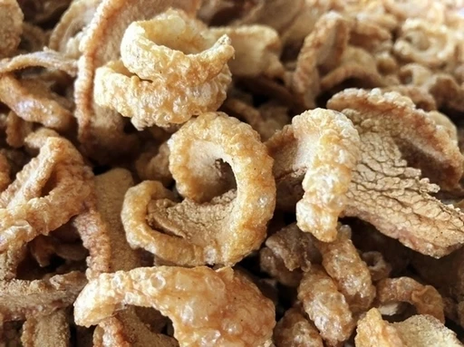 Deep Fried Pork Skin for Appetizers or as a side dish Made from Quality pork Packed in Gags Weighing 1 KG