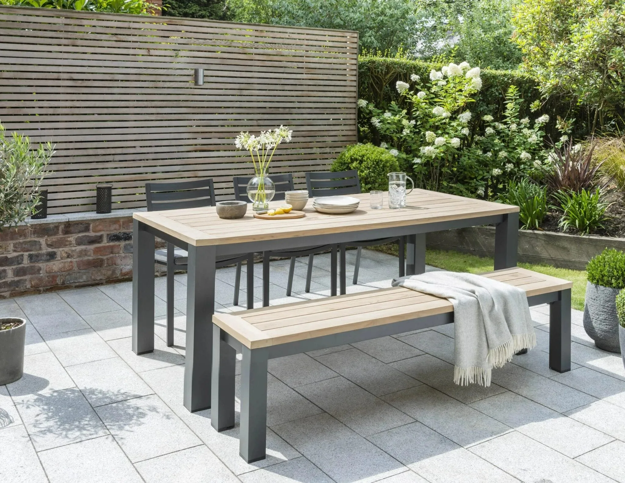 Dining Table with Chairs and Bench with Steel Framework and Sleek Design for Robust Outdoor Furniture