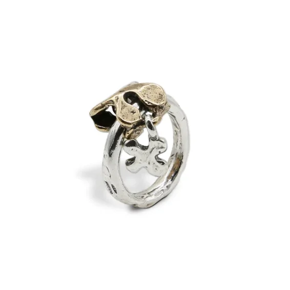 Handmade luxury puzzle charm ring in 925 silver with bronze On the stem of the silver ring runs the bronze element in the shape
