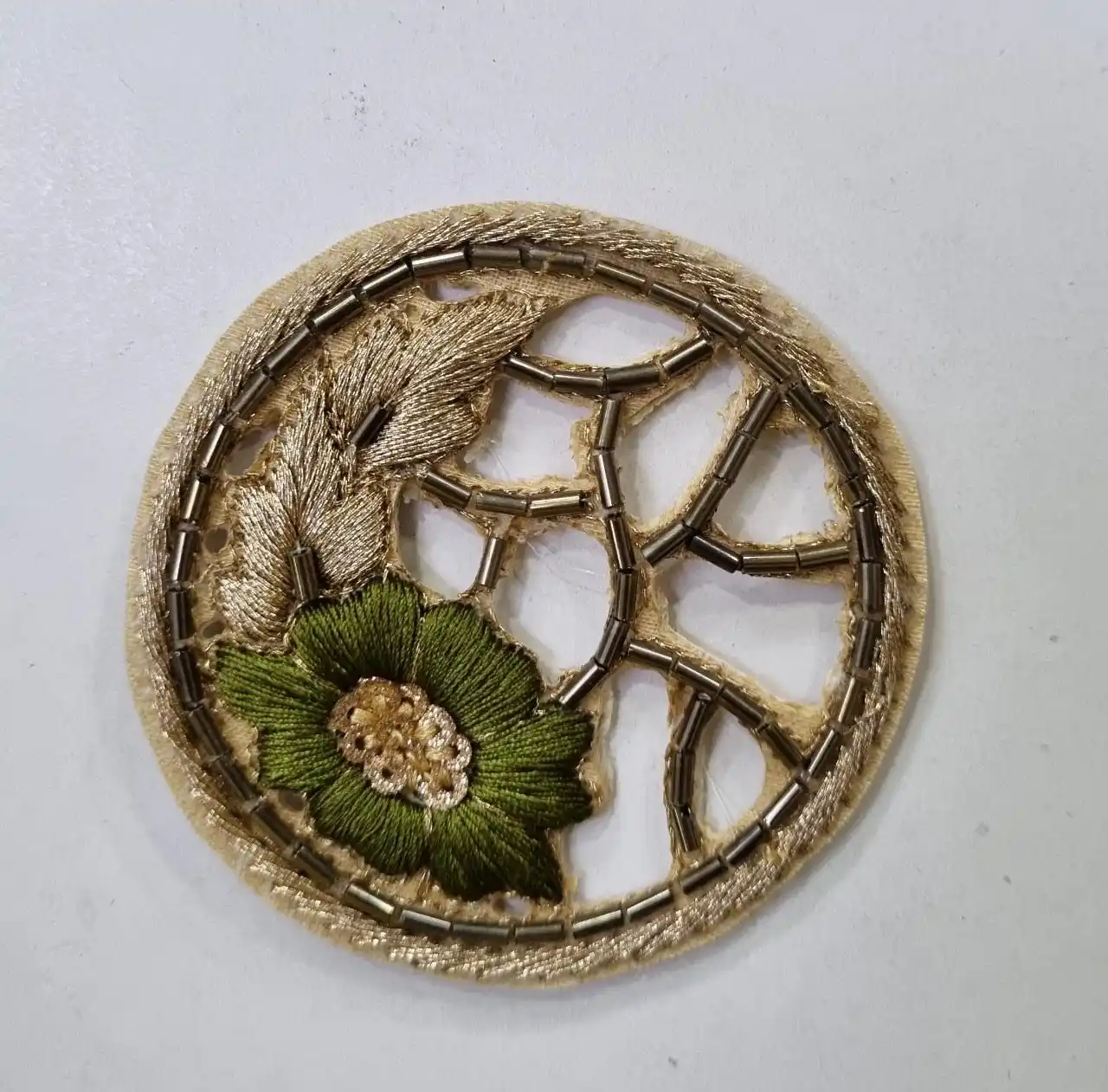 custom made embroidered patches with floral patterns including bead work and gold thread for dress designers