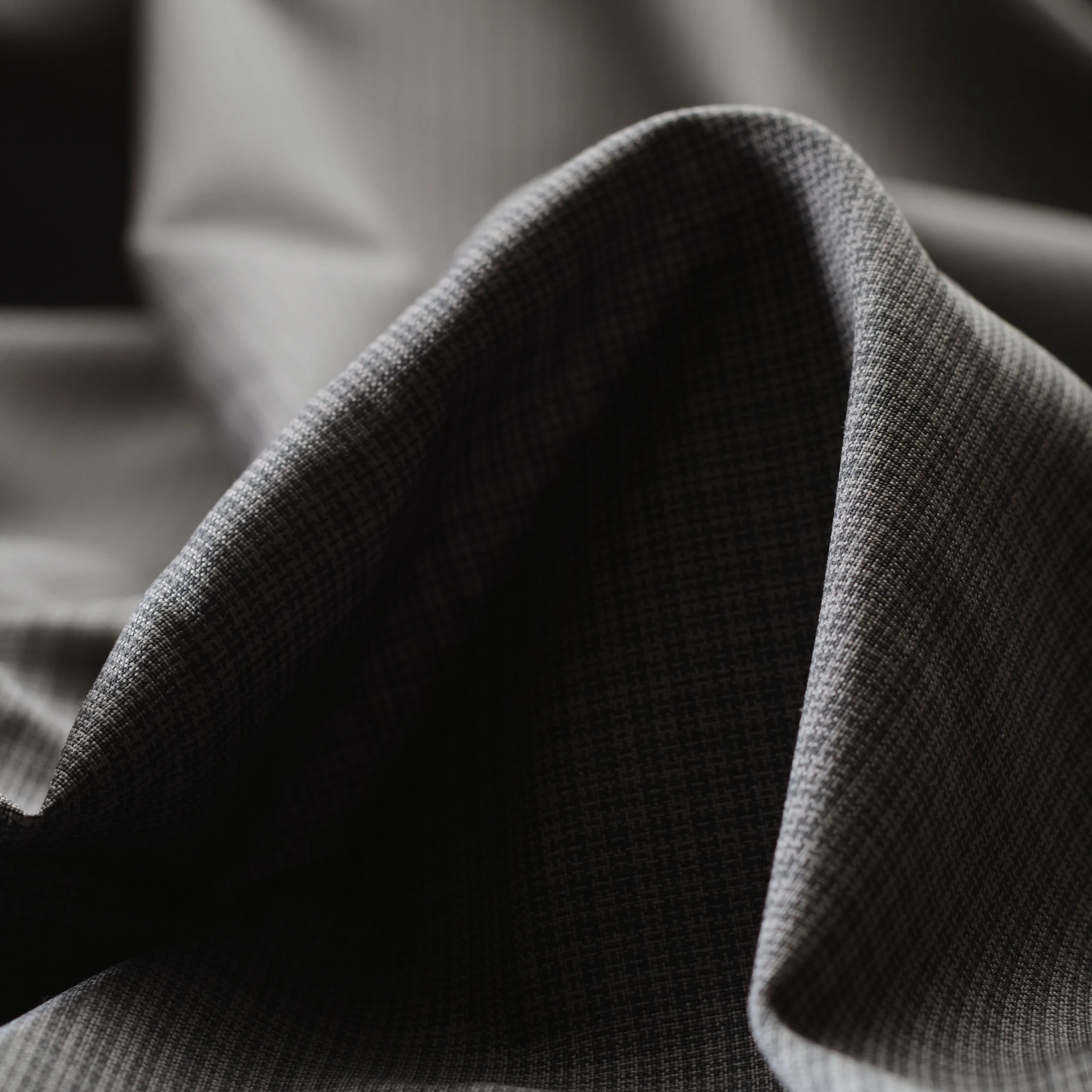 100% luxury fine wool with micro-design, readily available close-out wool fabric. Sustainable luxury wool, close out fabric.